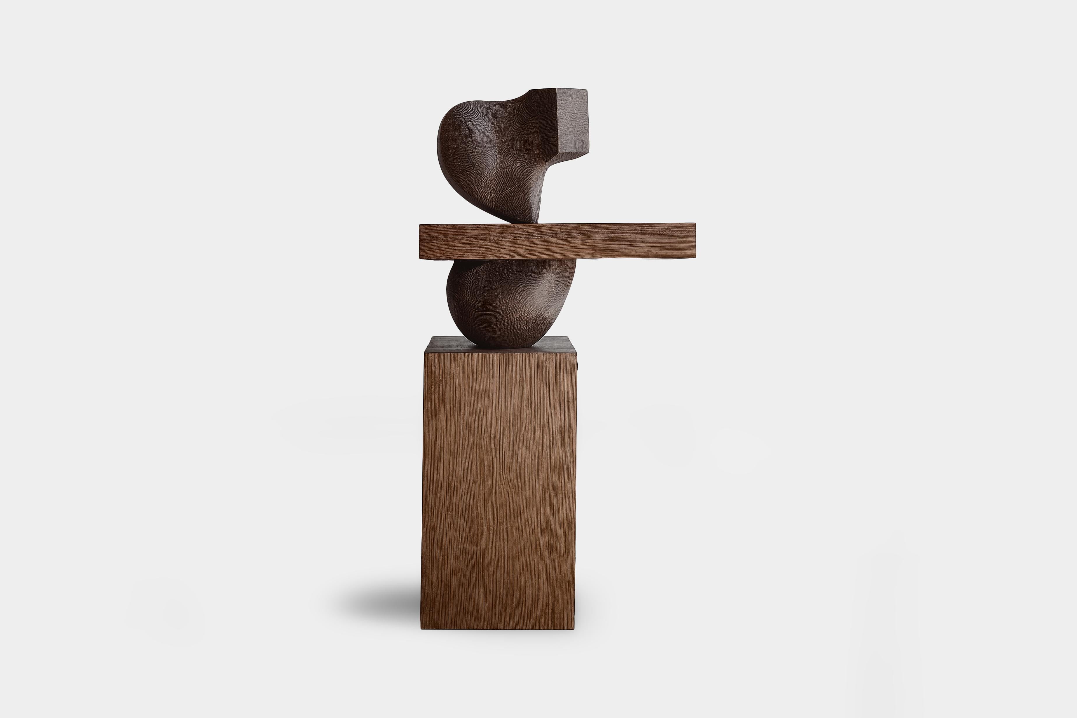 Scultura in legno Lull No150 per interni contemporanei - Design di Joel Escalona

---
L'equilibrio e la tensione sono al centro di queste sculture. L'interazione tra le forme lisce e arrotondate e le basi solide e angolari crea un delicato