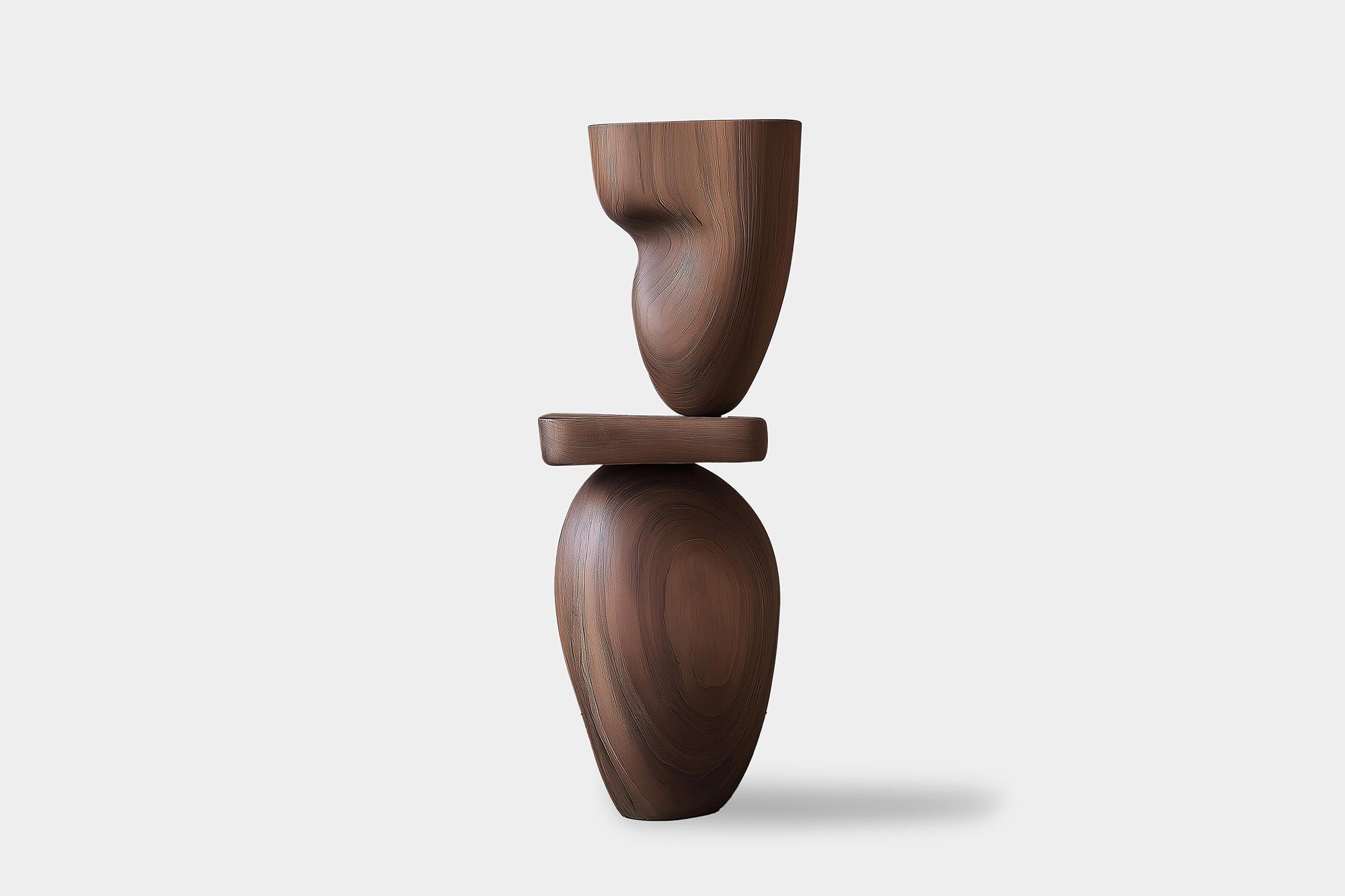 Lull No78 Scultura totem moderna in legno di Joel Escalona - Ideale per un arredamento di lusso

---
L'equilibrio e la tensione sono al centro di queste sculture. L'interazione tra le forme lisce e arrotondate e le basi solide e angolari crea un