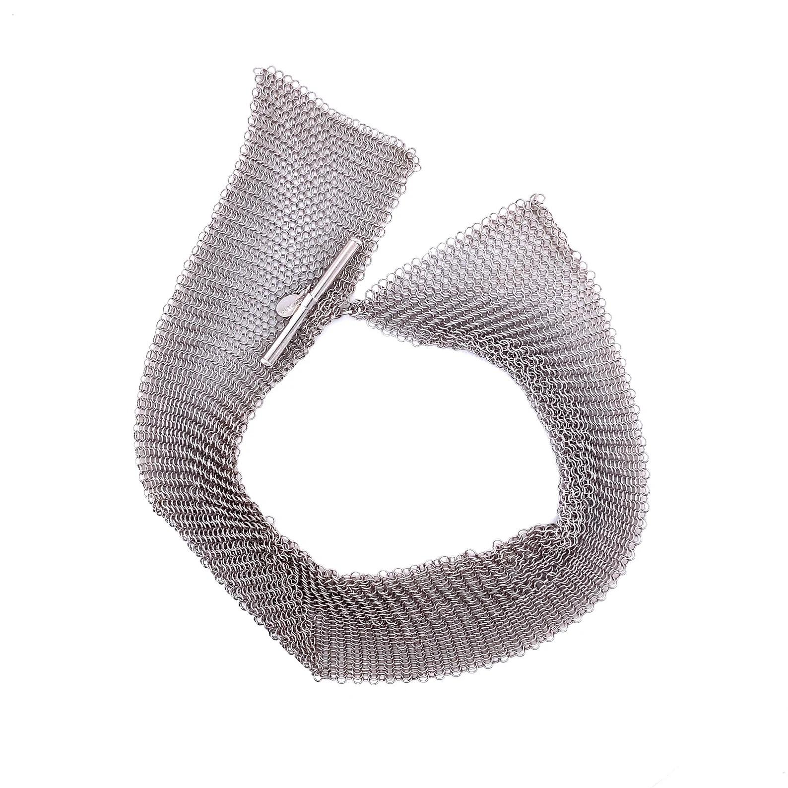 Lull, Sculptural Chainmaille Mesh Sterling Silver Bracelet by Ashley Childs - fine, delicate sculpted mesh, hidden opening for toggle clasp, rhodium vermeil sterling silver; measures approximately 1 inches wide, 7 inches in length
Fine Mesh