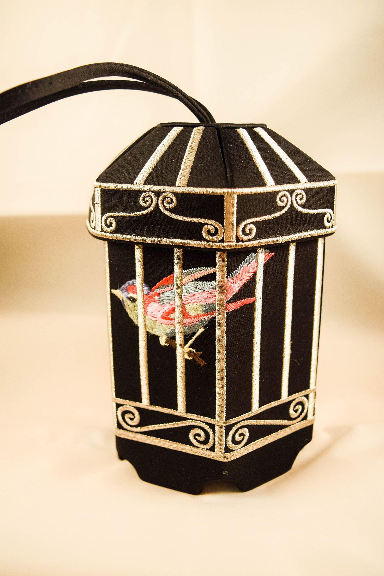 Wonderful Lulu Guiness Bird Cage extremely rare evening bag
They were a small production of 500 pieces.
Luckily our one survived in a fantastic original condition in it's inner and outer box 
with all the ribbons,tissue and card.
Unused new
