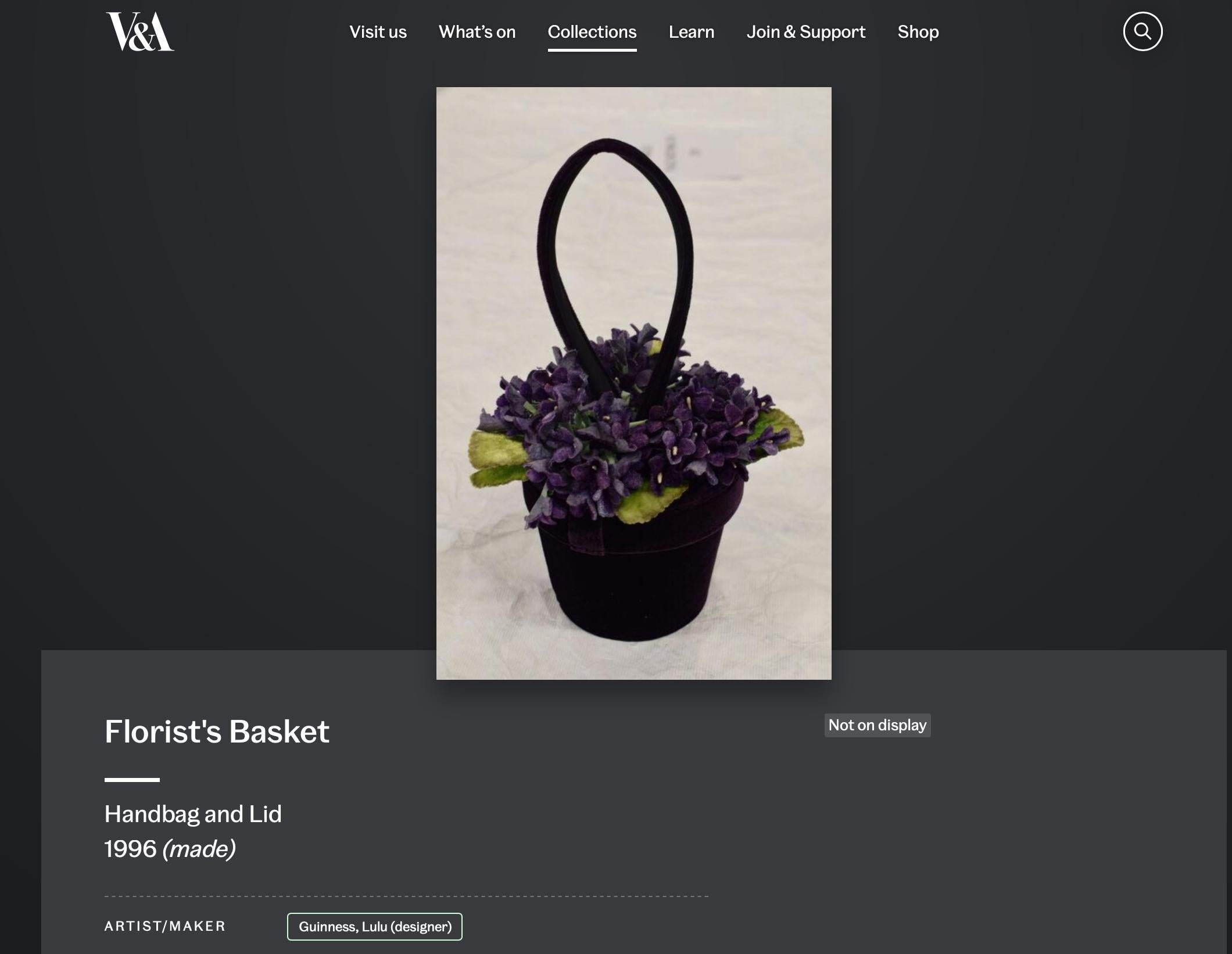 Fun and quirky Lulu Guinness violet flower pot mini bag from 1996. The pot is made from a purple silk velvet with a lid that is covered with purple and green faux violets. A matching loop wristlet handle stems through the centre of the lid. The lid