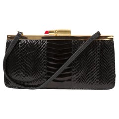 Lulu Guinness Schwarze Lippenstifthandtasche aus Leder 