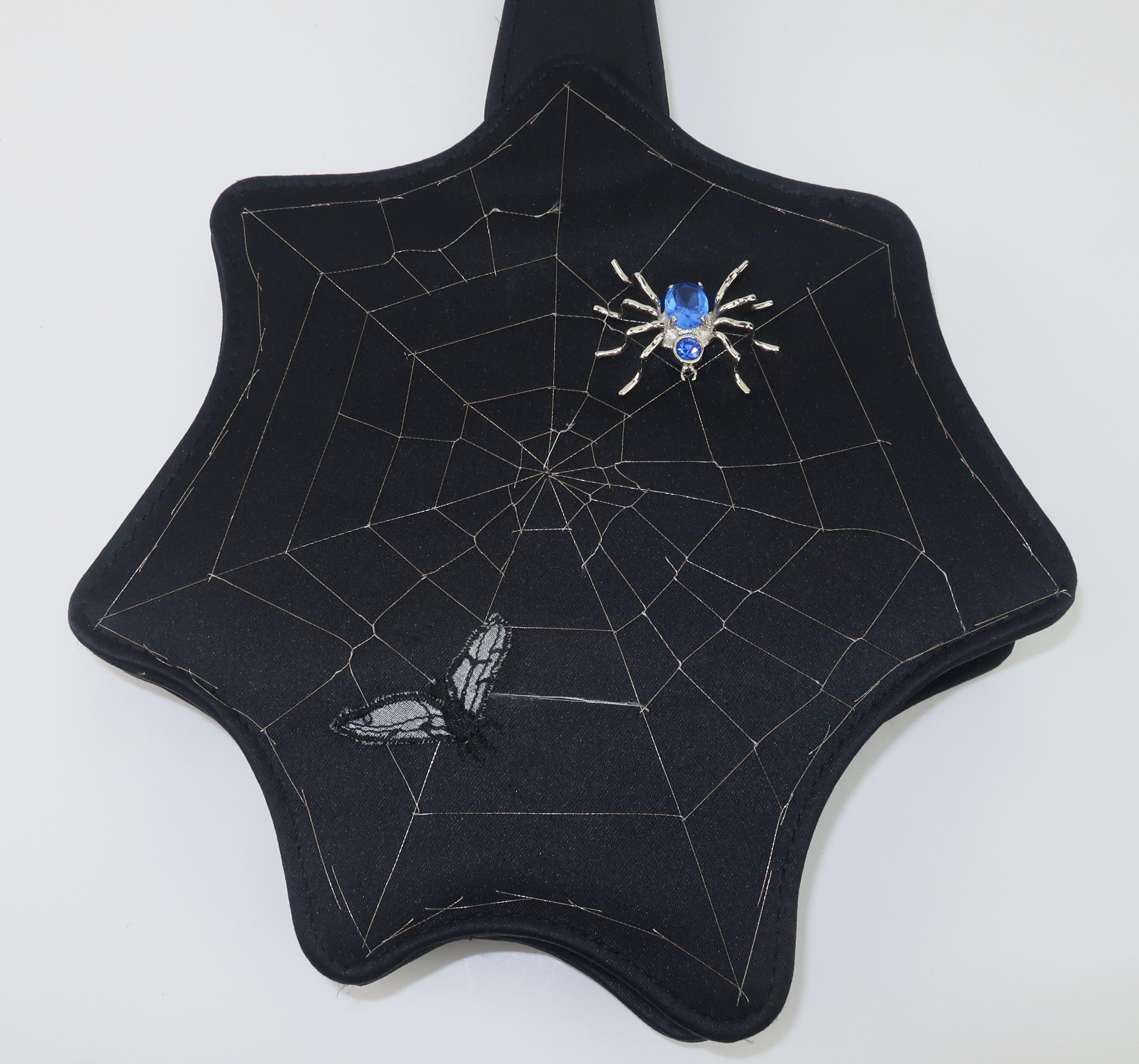 ‘Get yourself a great handbag and you've got yourself a friend for life’, and this little spider sitting in her web wants to be your friend!  The motto certainly fits for famed English handbag designer, Lulu Guinness, who has created unique pieces