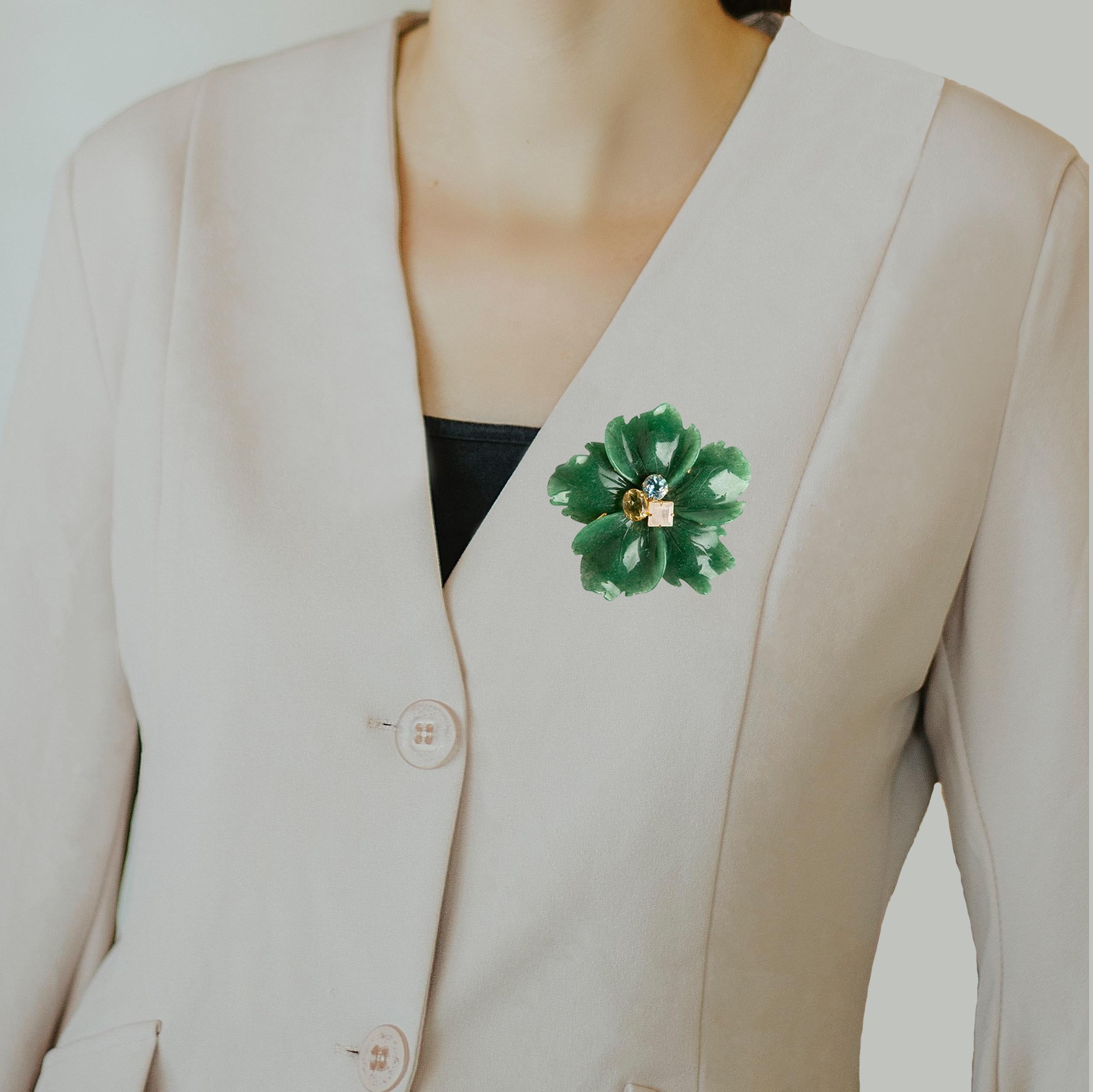 Lulu Pendant/Brooch crafted from semi-precious stones features a stunning flower design in soft colors, perfect for complementing any outfit throughout the seasons. Its retro and vintage-inspired design allows for versatile styling — wear it as a