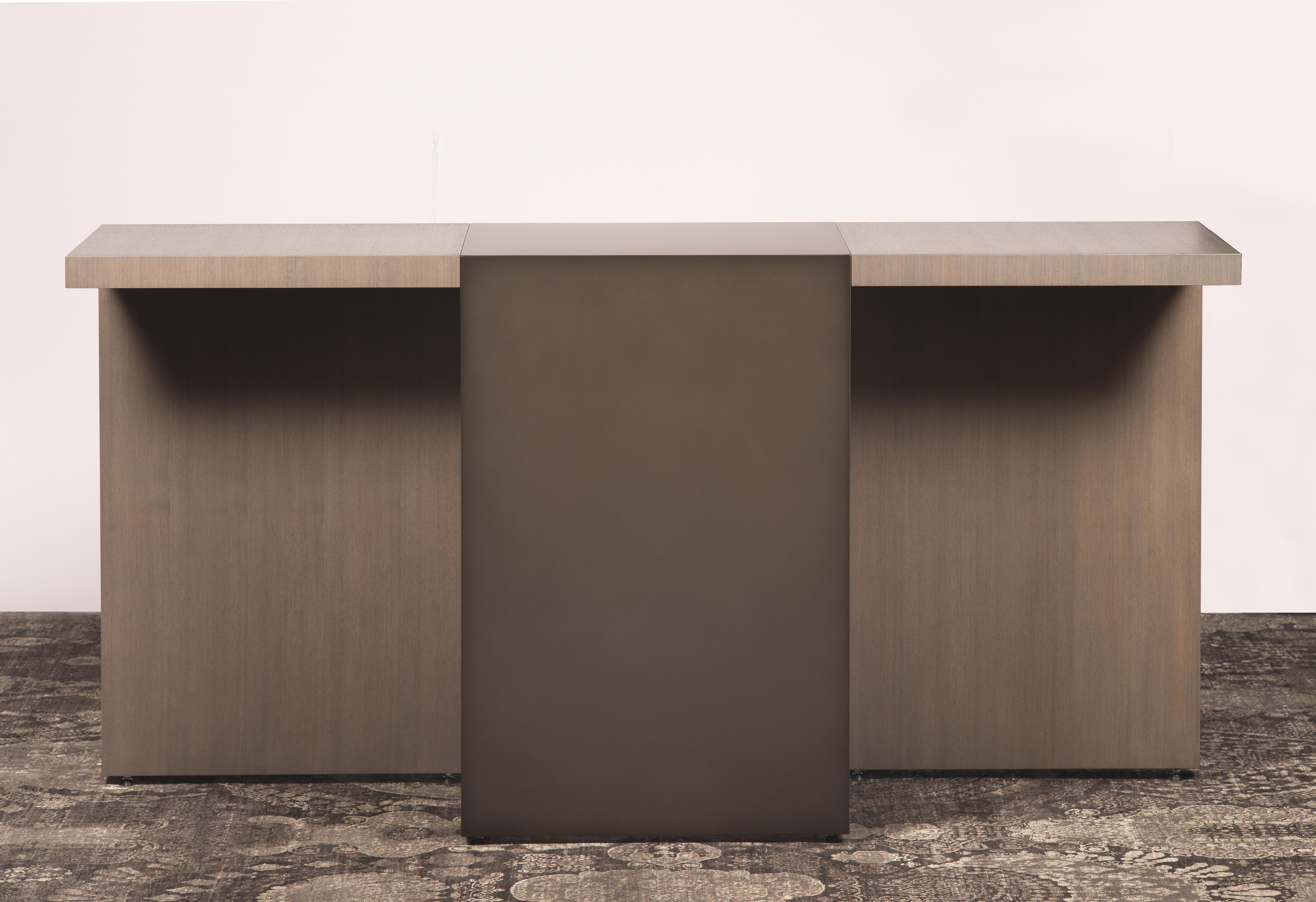 The LUMA design workshop flip console table is the result of thoughtful design and expert craftsmanship. Two-stone oak ends offset a charcoal powder coated steel center.

Like all LUMA furniture, this piece is made to order, and can be crafted to