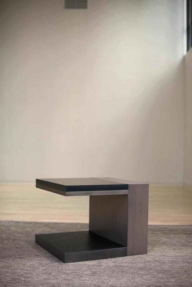 The LUMA design workshop float side table is the result of thoughtful design and expert craftsmanship. A LUMA fog resin top sits on an apron which matches the smoke powder coat base. Balancing the two is a stone oak side. 

Like all LUMA Furniture,