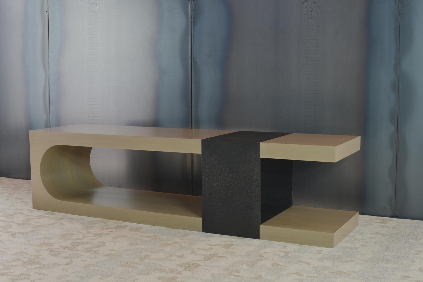 The LUMA design workshop silo bench is the result of thoughtful design and expert craftsmanship. The wooden body of the bench has a Rye finish. The metal strap is in our blackened quartz finish, which has a tight, consistent texturing.

Like all