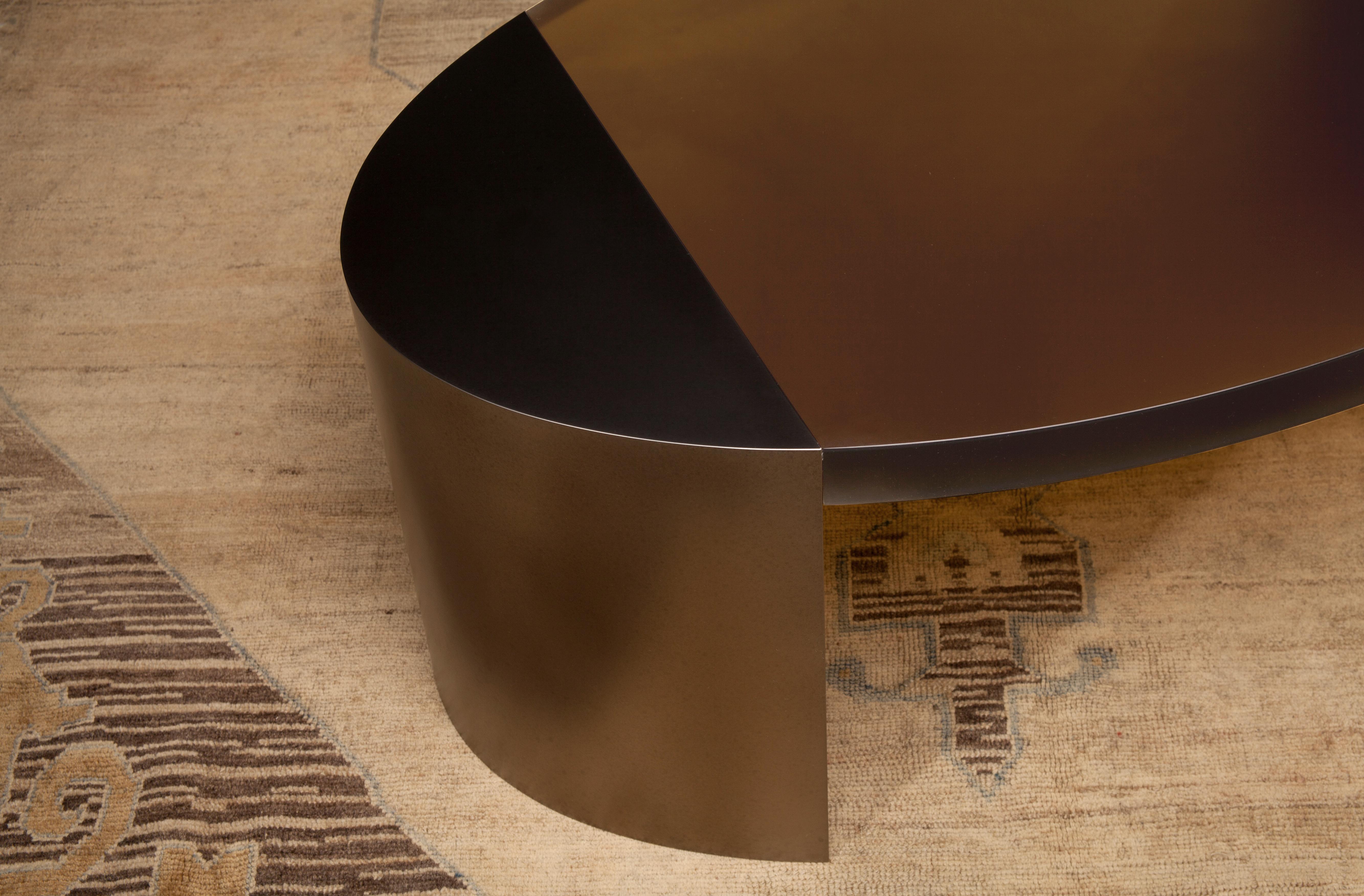 The LUMA Design Workshop Silo coffee table is the result of thoughtful design and expert craftsmanship. An Earth resin top is held between two Nickel finished ends to create the ellipse shape which gives this table its character.

Like all LUMA