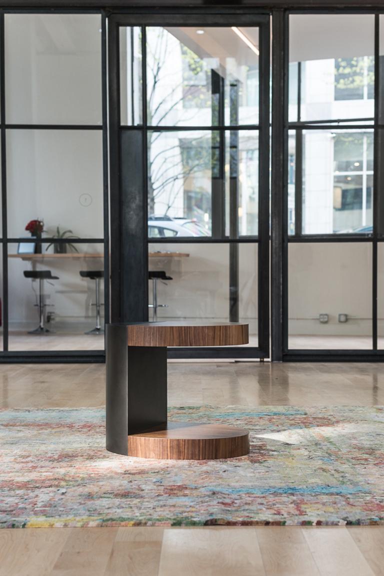 The LUMA design workshop silo occasional table is the result of thoughtful design and expert craftsmanship. Natural walnut shelves effortlessly cantilever from a smoke powder coated steel base.

Like all LUMA Furniture, the silo occasional table is