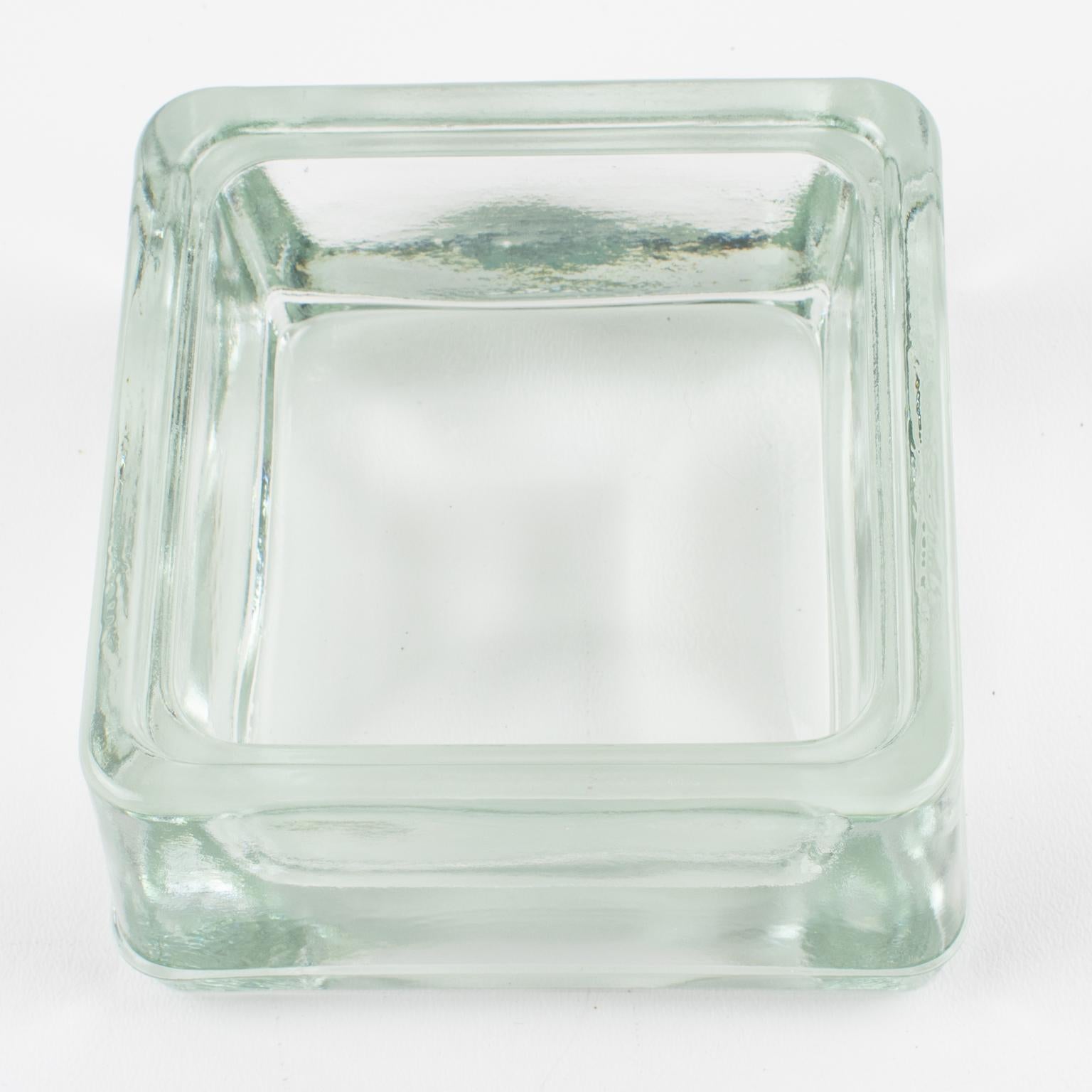 This industrial thick molded glass desktop accessory, desk tidy, ashtray, or catchall, was manufactured by Lumax, France, in the 1950s. Original design by Le Corbusier. This lovely vide poche will add a touch of vintage modernism to any contemporary