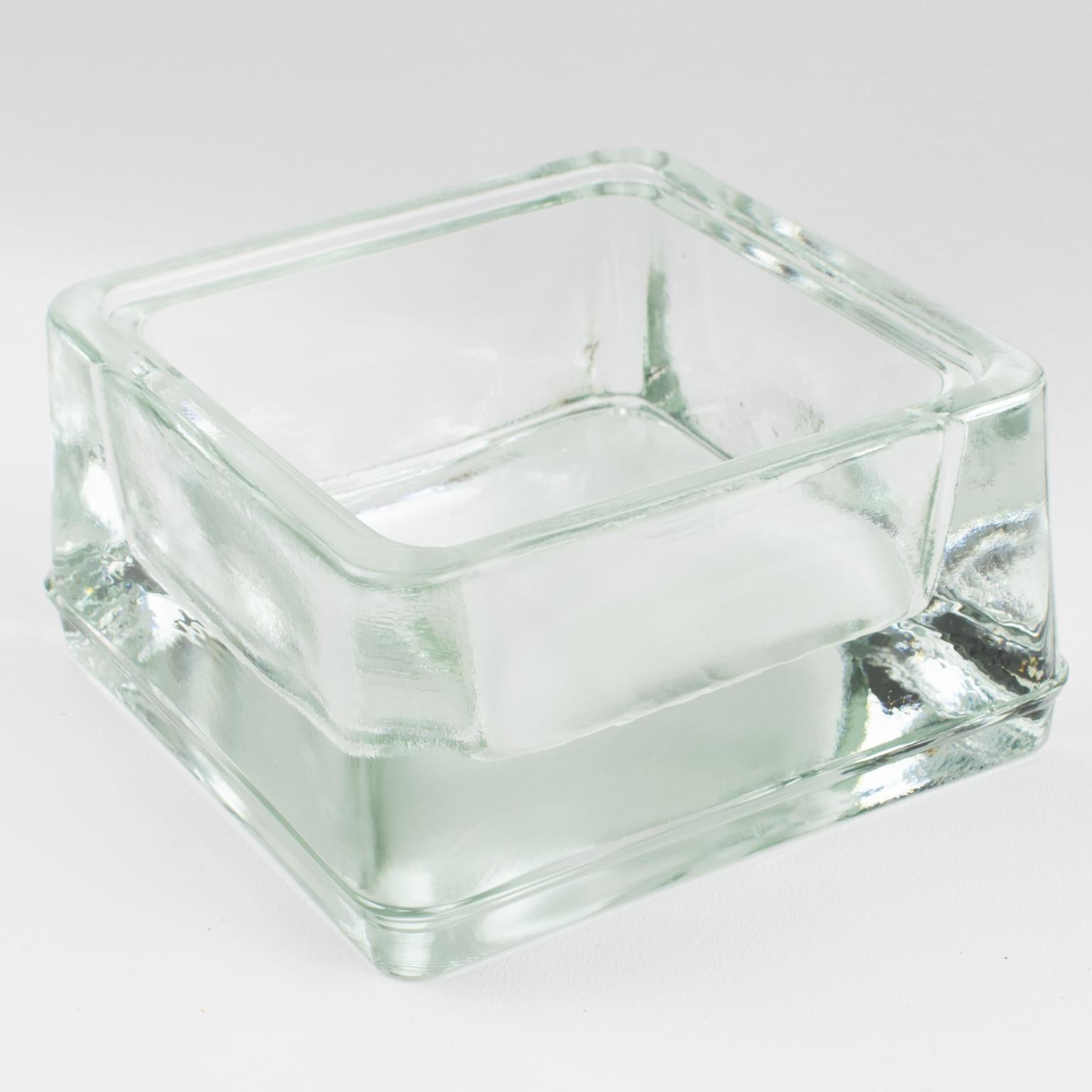 This industrial thick-molded glass desktop accessory, desk tidy, ashtray, or catchall, was manufactured by Lumax, France, in the 1950s. Original design by Le Corbusier. This lovely vide poche will add a touch of vintage modernism to any contemporary