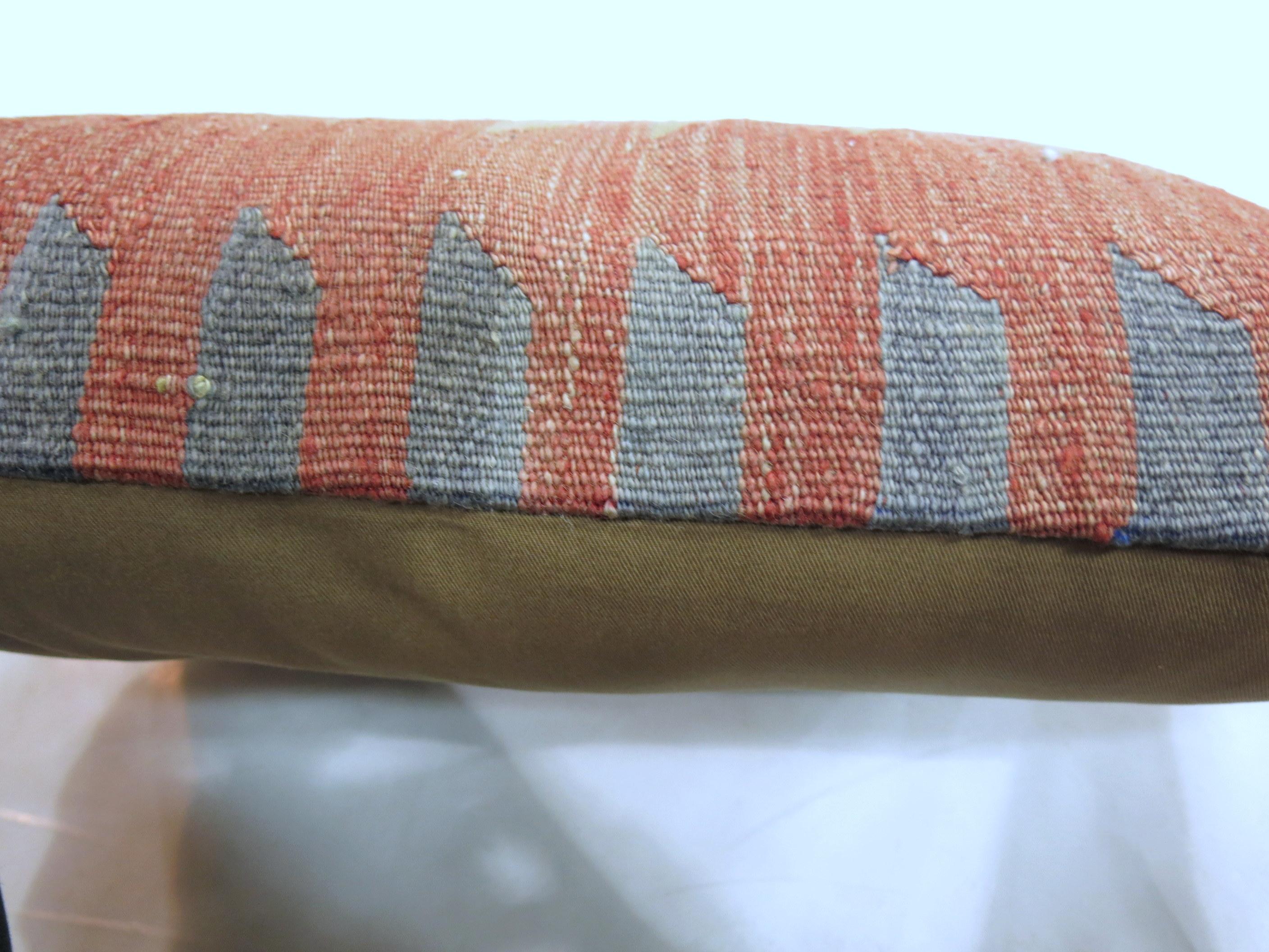 Pillow made from a vintage Turkish Kilim with cotton back. Zipper closure and foam insert provided. 16