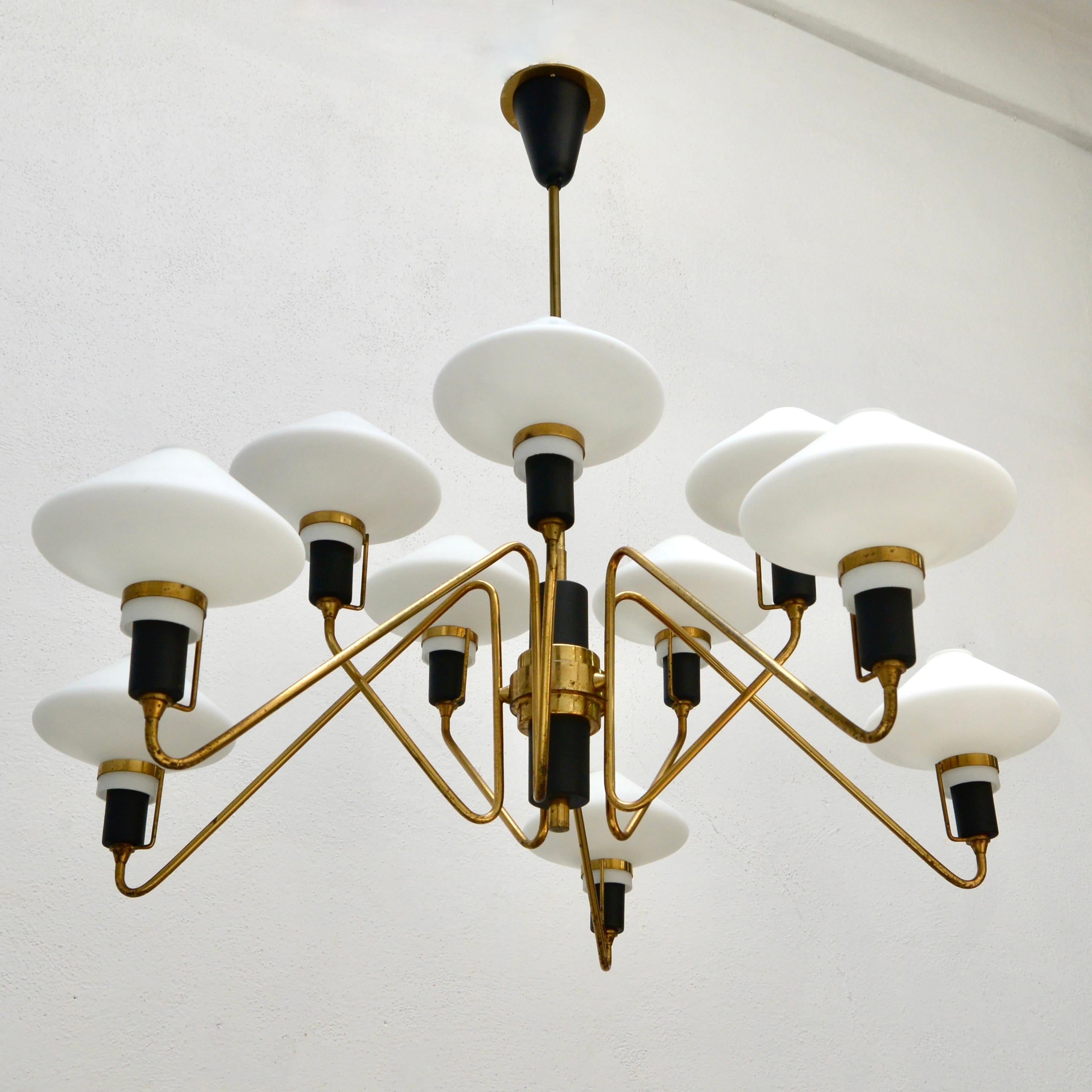 Original finish, partly restored of the period mid century Italian 1950s brass, aluminum and glass chandelier with 10 hand blown glass shades by Lumen of Italy. Wired with 10-E12 candelabra based sockets for use in the US. Light bulbs included with