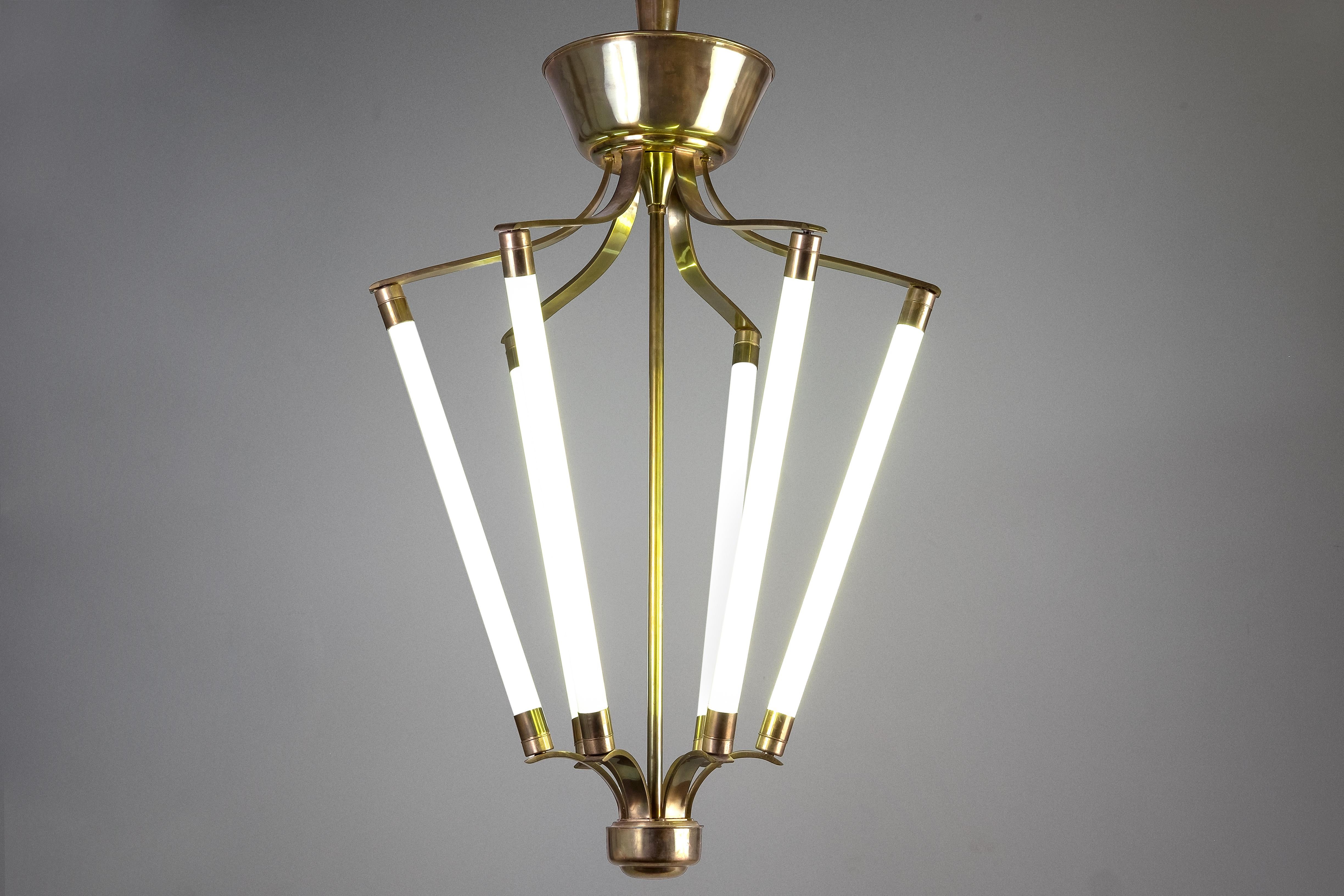 Milieu du XXe siècle Lustre lustre néon Lumen avec structure en métal et laiton, design italien, années 1940 en vente