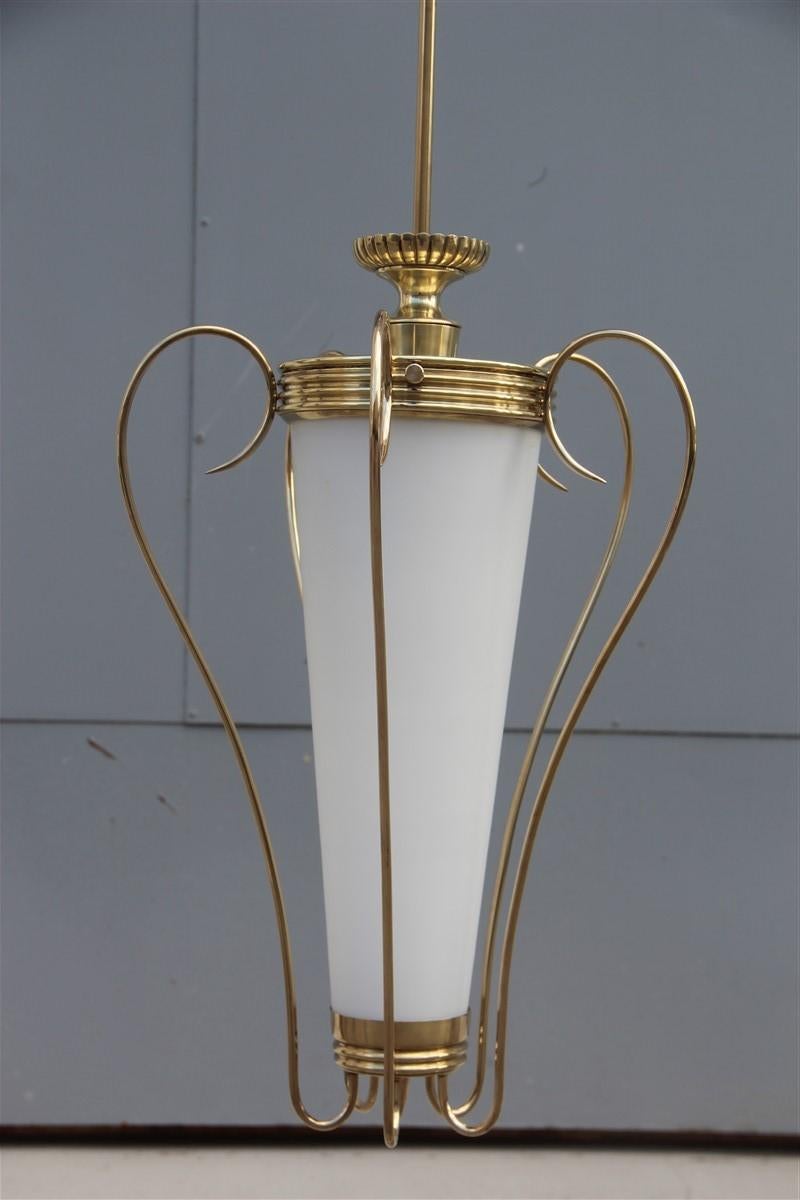 Lumi Milano lantern midcentury Italian design brass gold white Murano glass, 1950s
Only ceiling height cm.53, diameter cm.35
1 light bulb E27 Max 80 watt.