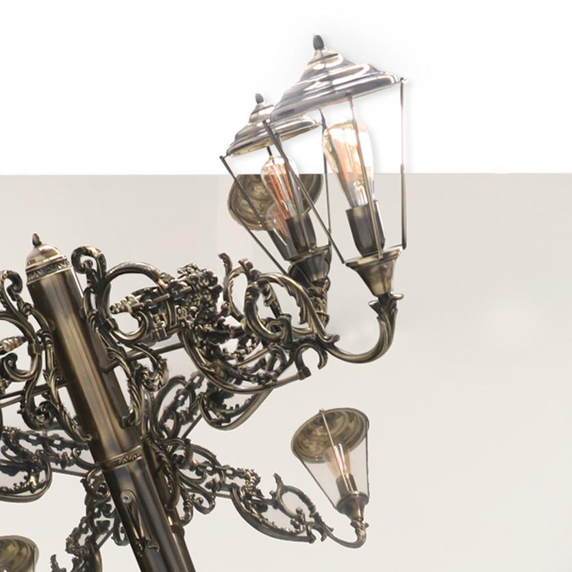 The mystic of late 19th century boulevards is brought home by the masterpiece Lumière big mirror lamp. A confluence of Victorian street lights and architectural tectonic form, the Lumière exemplifies the contemporary dualities of art and
