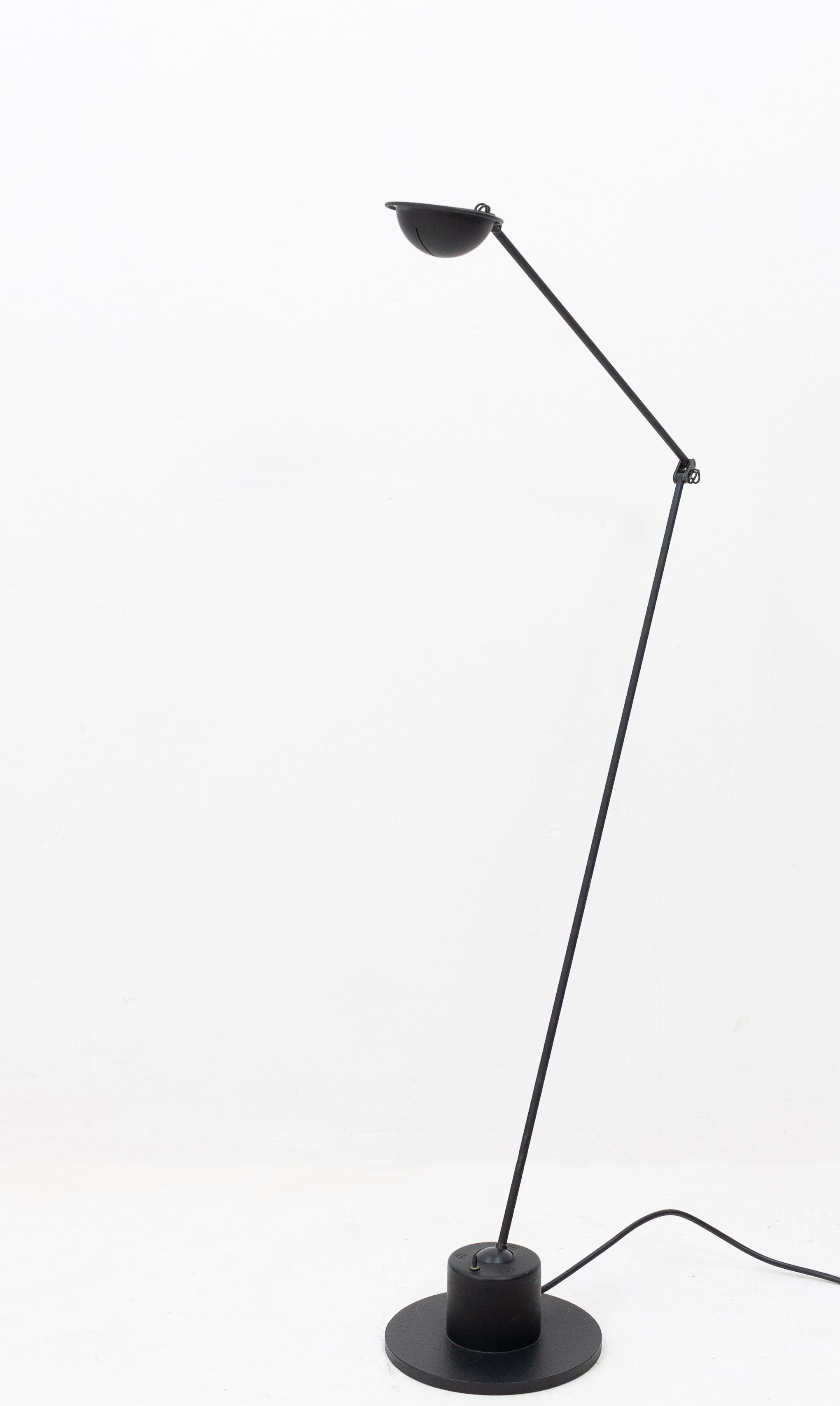 Belux Luminaire ball floor lamp designed by Hannes Wettstein, Switzerland 1982. Black painted aluminium and steel featuring a ball joint in the base for great range of motion. Rare top quality lamp in very good condition.