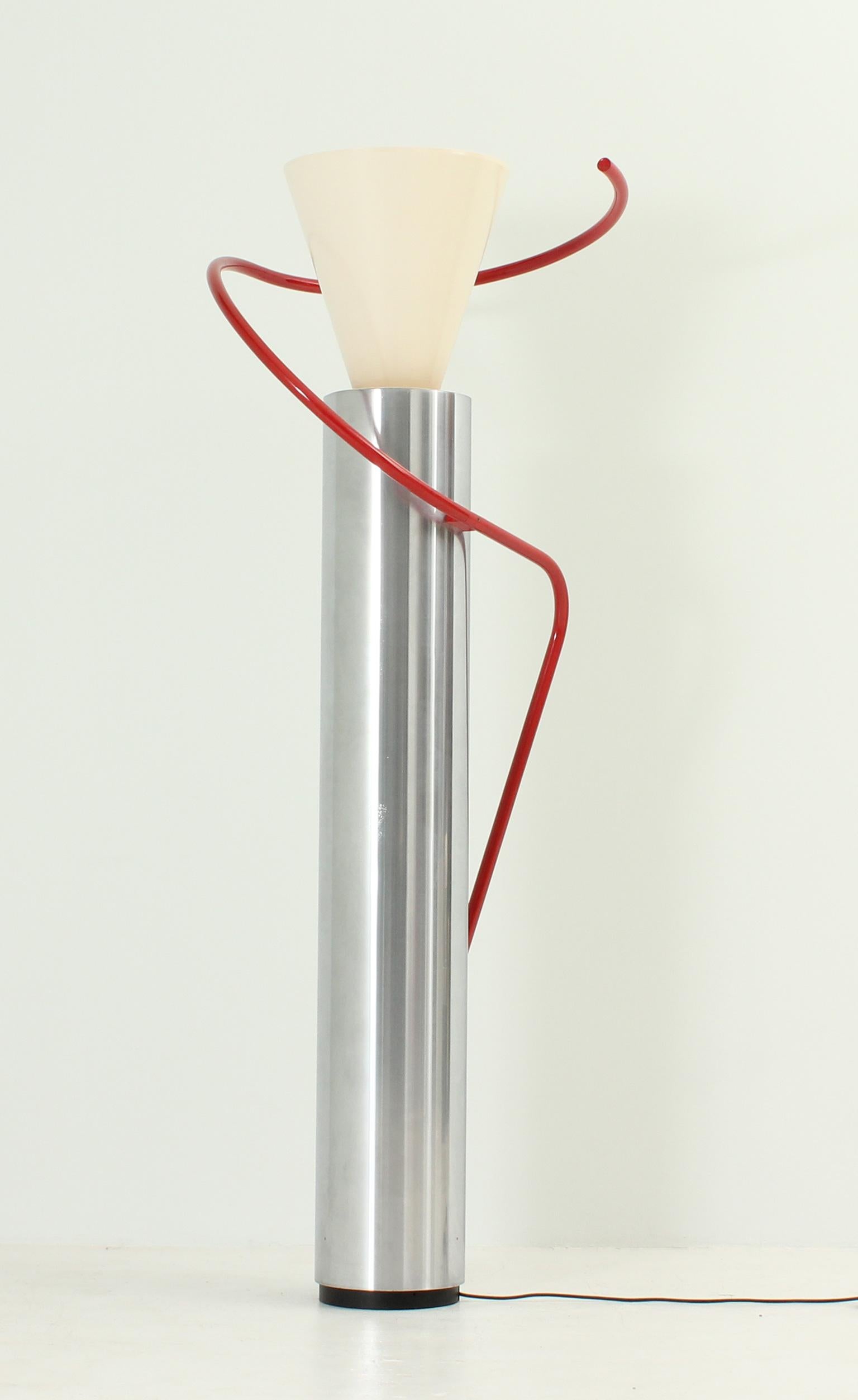 Luminator floor lamp originally designed in 1929 in chrome and wood by Luciano Baldessari for the italian pavillion in the Barcelona Fair of 1929. This is the Luceplan edition from 1979. Chrome and lacquered metal and aluminium.