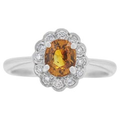 Luminous 0.66ct Sapphire and Diamond Ring in 18K White Gold