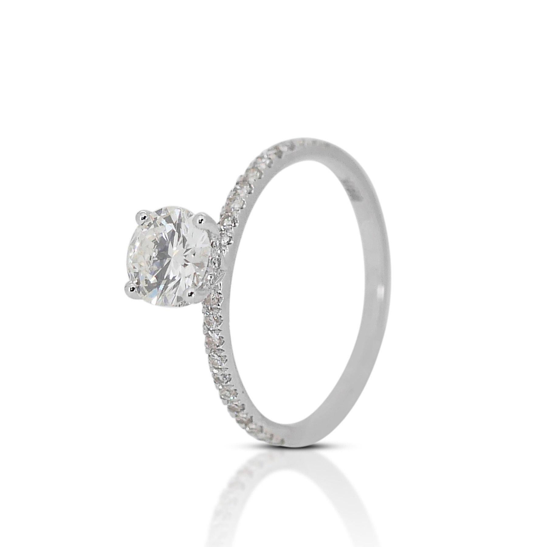 Luminous 1.16ct Diamond Pave Ring in  18k White Gold - GIA Certified

Indulge in the timeless elegance of this exquisite 18k white gold diamond pave ring, meticulously crafted to captivate hearts and sparkle with unparalleled brilliance. Enhancing