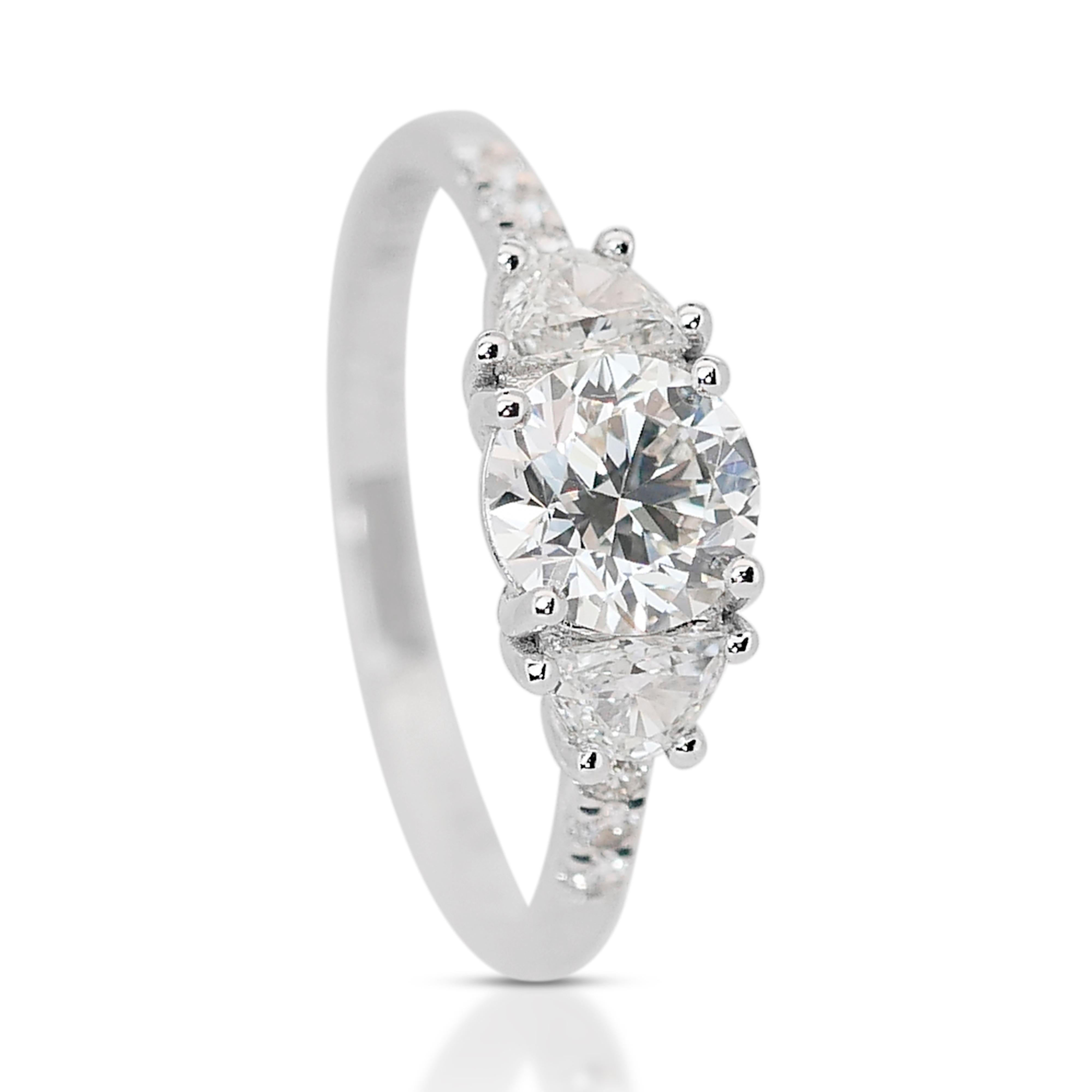 Luminous 18k White Gold Diamond Pave Ring w/2.00 ct - IGI Certified

Embrace the luxurious allure of our 18k white gold diamond ring, a symbol of elegance and refined taste. Centrally featuring a mesmerizing 1.02 ct round diamond. Complementing the
