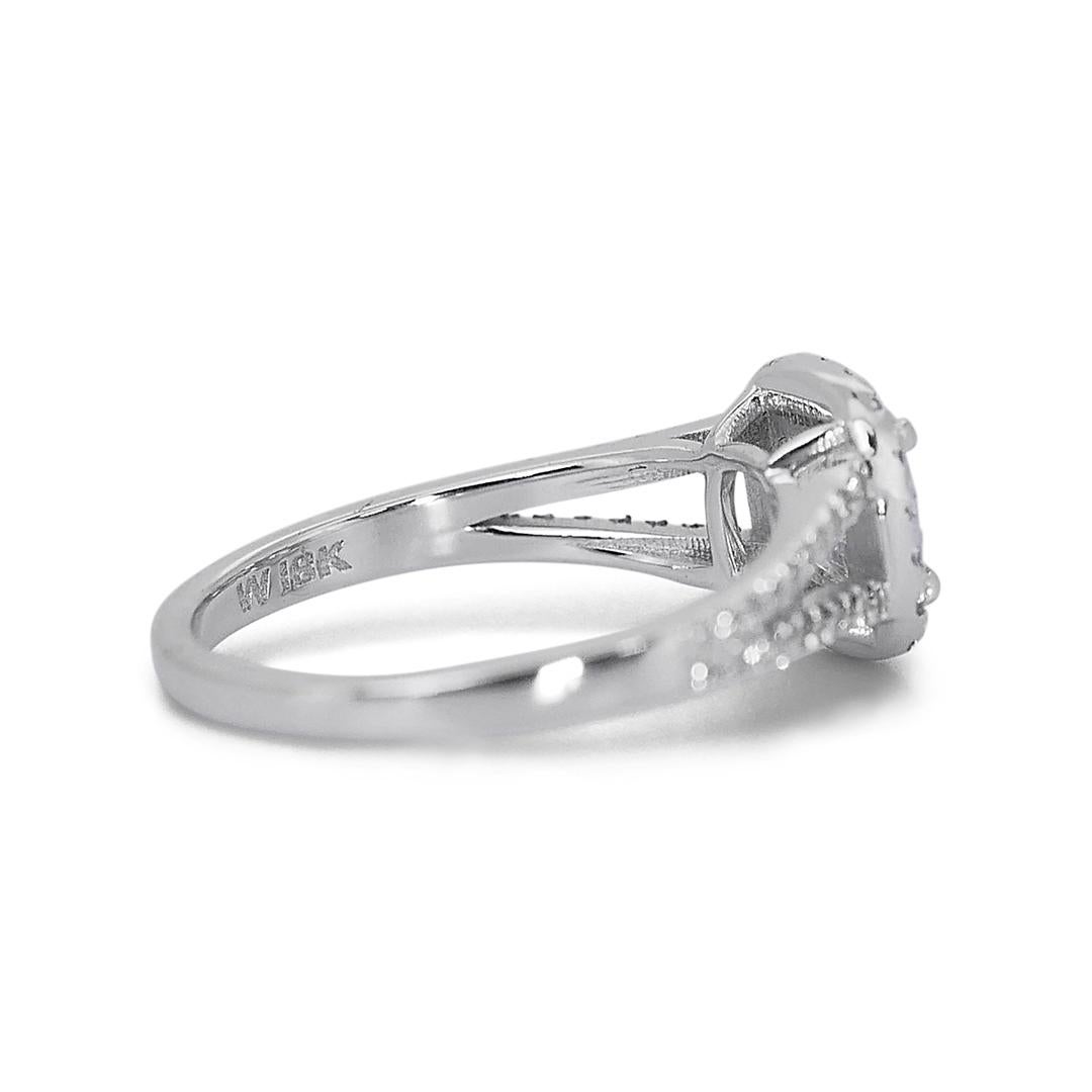 Luminous 18K White Gold Ideal Cut Infinity Natural Diamond Ring w/1.82ct

Experience the timeless allure of our Luminous 18K White Gold Ideal Cut Infinity Natural Diamond Ring. At its core lies a stunning 1.50 carat modified brilliant cut diamond,