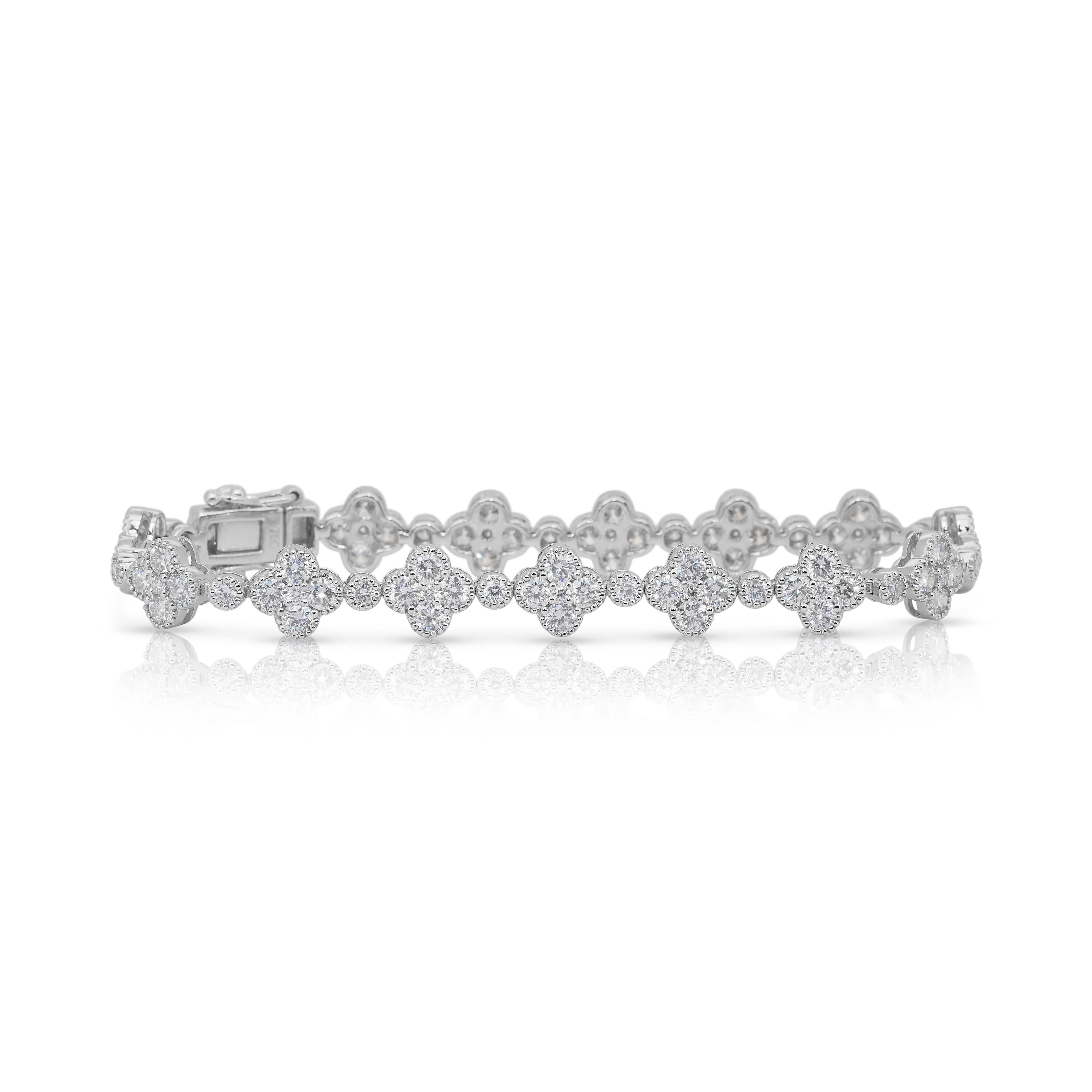 Luminous 2.46ct Diamonds Bracelet in 18k White Gold - IGI Certified

Radiating timeless sophistication, this 18k white gold bracelet sparkles with 90 round-cut diamonds totaling 2.46ct. Sixty primary stones totaling 1.86ct and thirty complementary