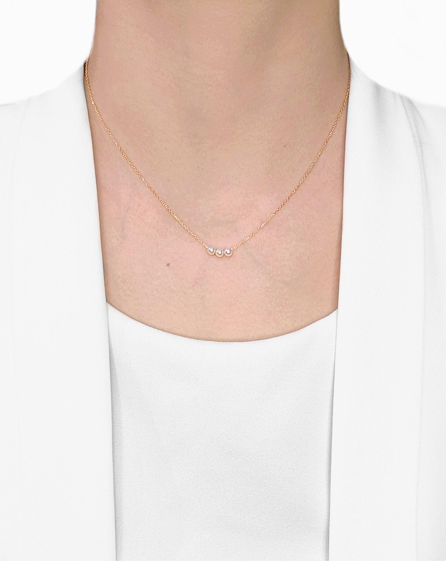 Timeless and graceful, this 18K Rose Gold necklace features three luminous Akoya pearls, each measuring 3.8mm in a classic round shape. Their blue-white hue radiates sophistication, creating a soft yet captivating glow against the skin. Delicate and
