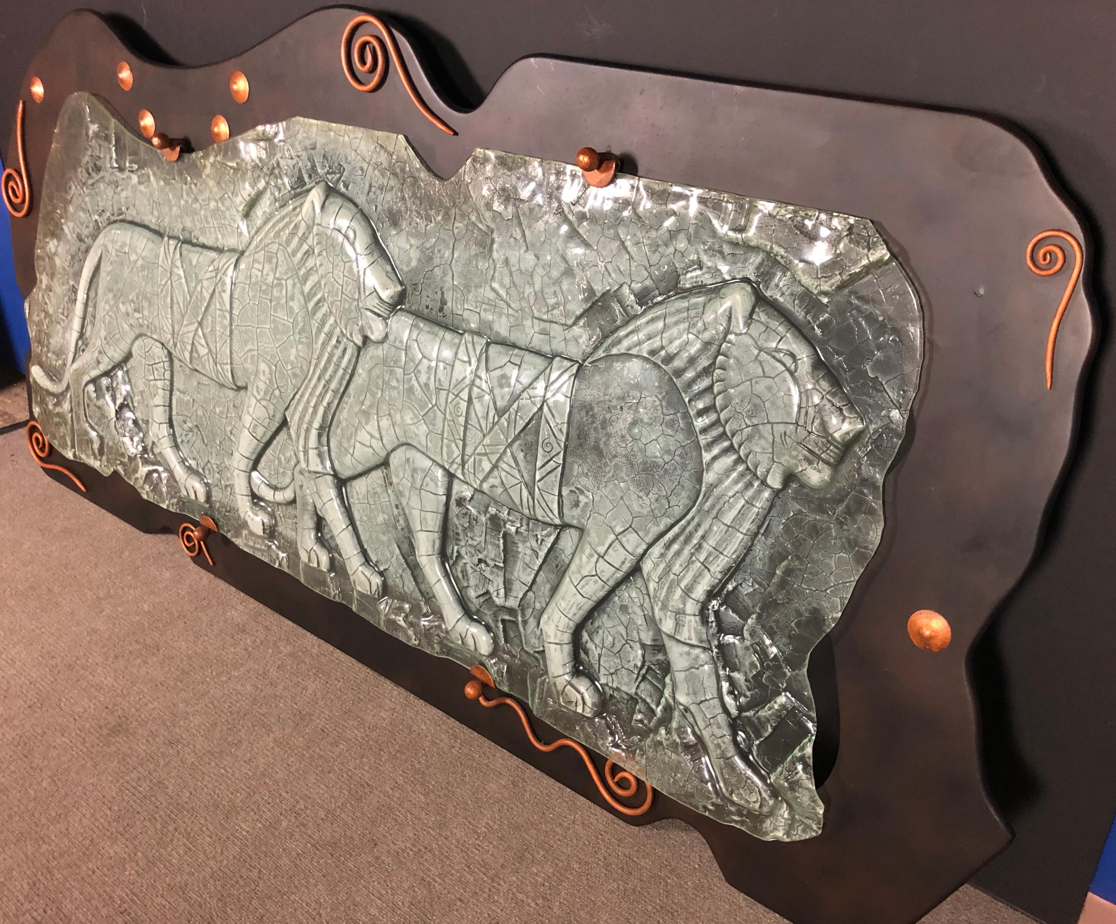 Impressive sculptural luminous wall hanging in glass and wrought iron, Mexico, circa 1980 De Anda Mr
Electrified wall art featuring two lions in stride, using glass slumping technique.
   