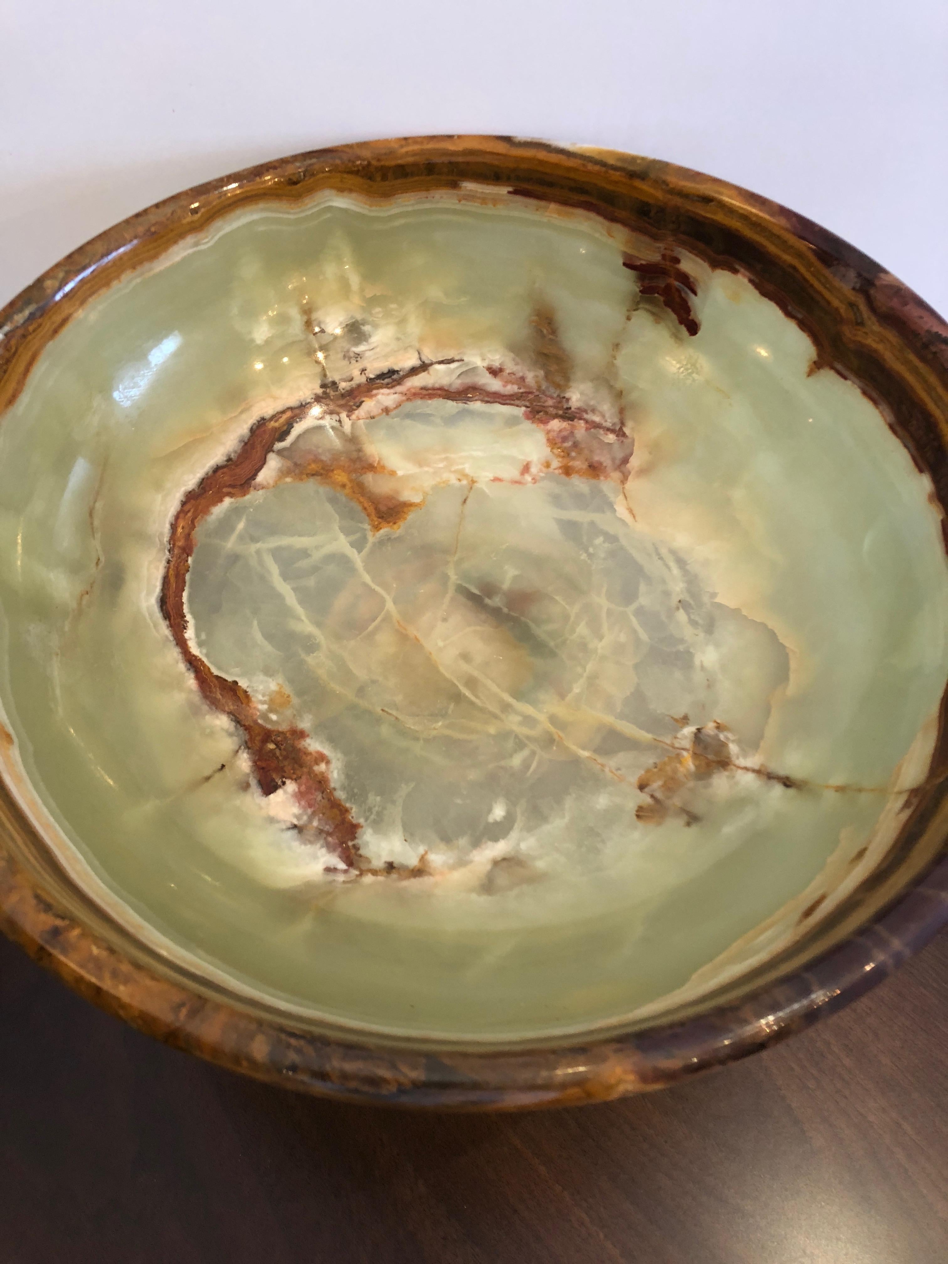 Absolutely gorgeous onyx centerpiece bowl of luscious colors including a pale green, cream, burnt orange and brown. Heavy and impressive. Interior depth 3.5 inches.