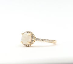 Luminous Opal & Diamond Halo Ring in 14k Yellow Gold