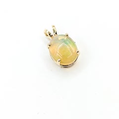 Luminous Opal Pendant in 14k yellow gold