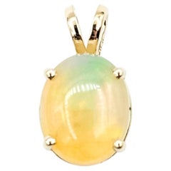 Luminous Opal Pendant in 14k yellow gold