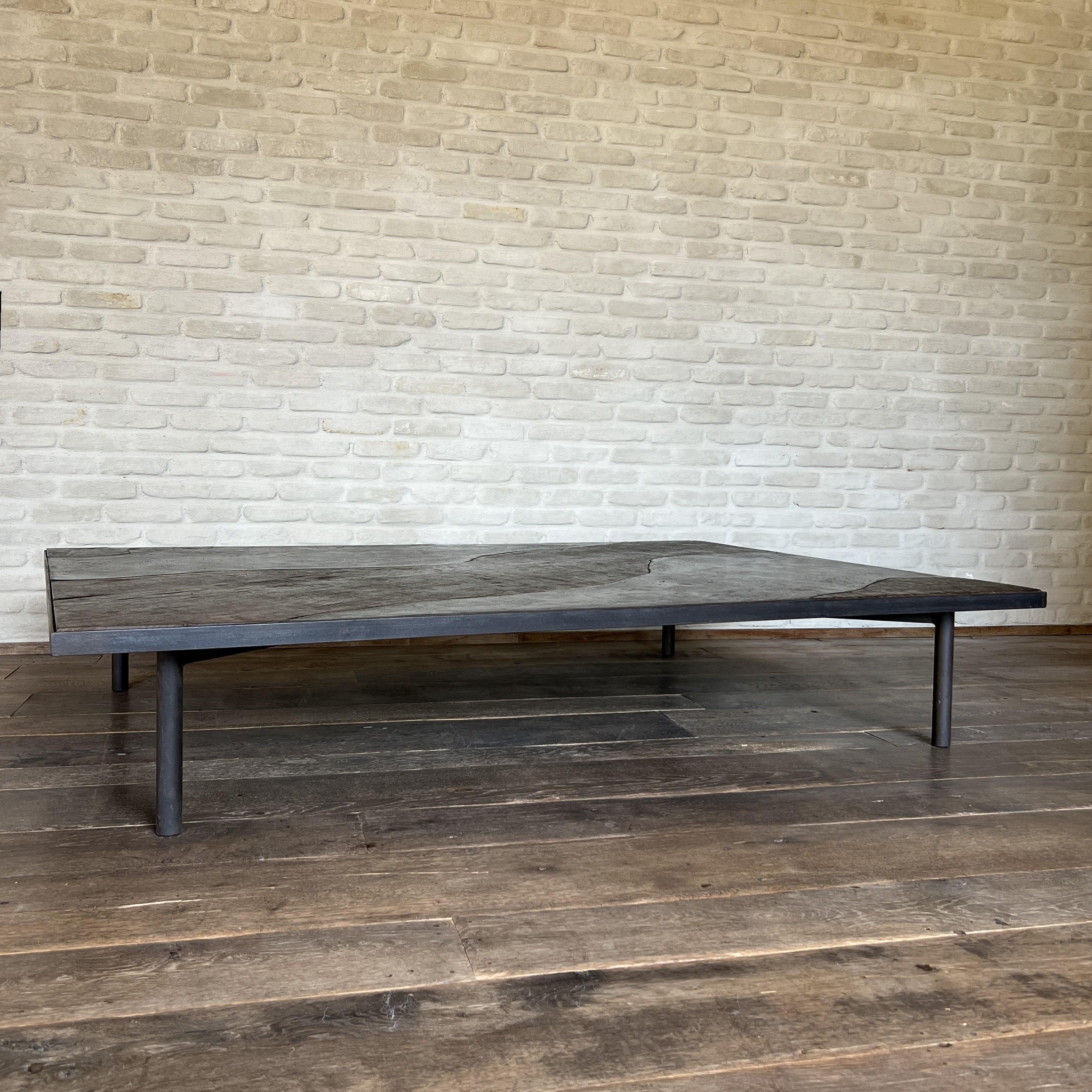 Our LUNA coffeetable with 18th century walnut and marbleplaster on a custom iron frame.