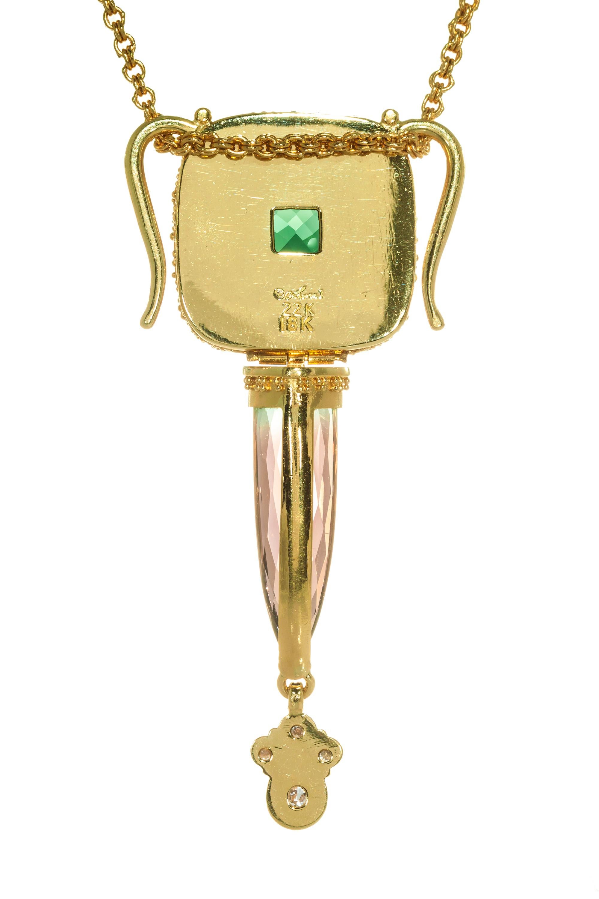 Luna Felix with diamond tourmaline pendant necklace. Set with green and watermelon Tourmaline with accent diamonds. Hooks on each side for chain or a pearl necklace attachment. 22k yellow gold 28 inch chain.  Luna Felix appraisal included. 

1
