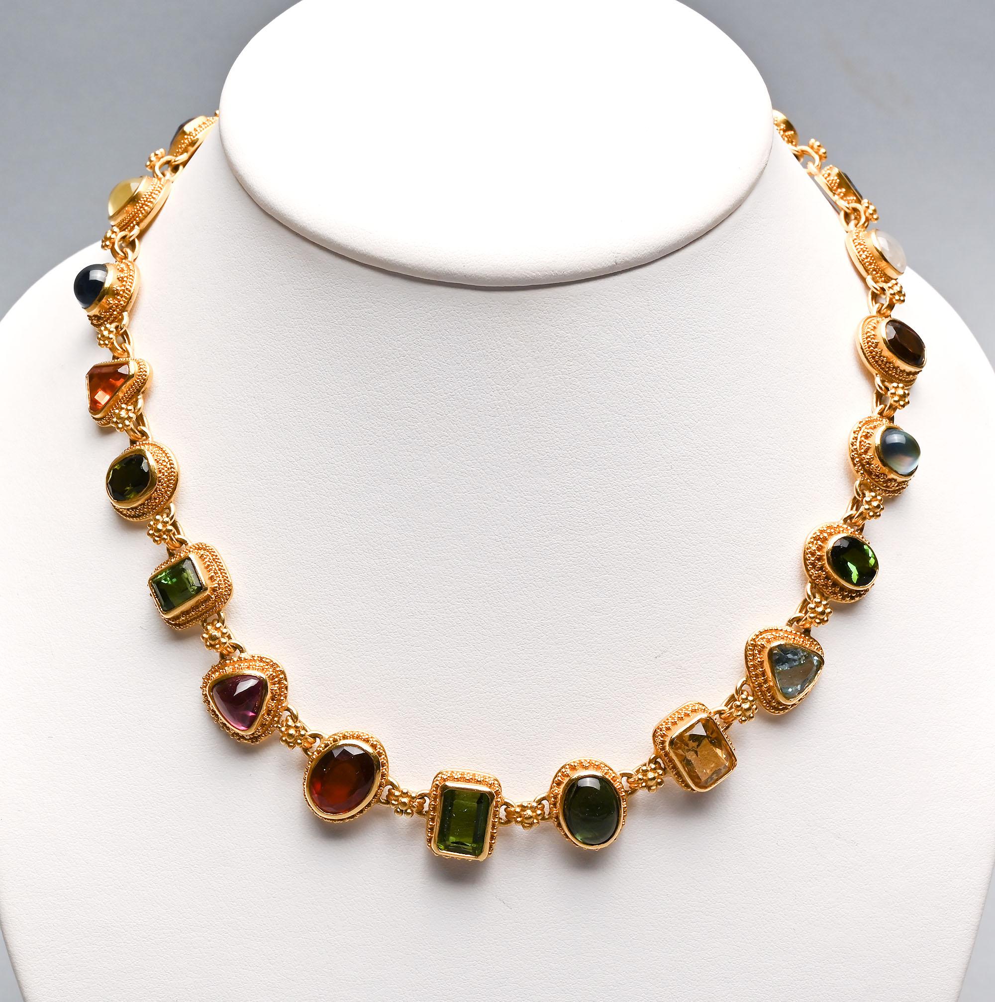 This multi -gemstone necklace by Santa Fe designer, Luna Felix is both arty and elegant. The twenty two links are a combination of round; oval; rectangular and triangular shapes. Among the stones are: moonstone; amethyst; garnet; citrine; aquamarine