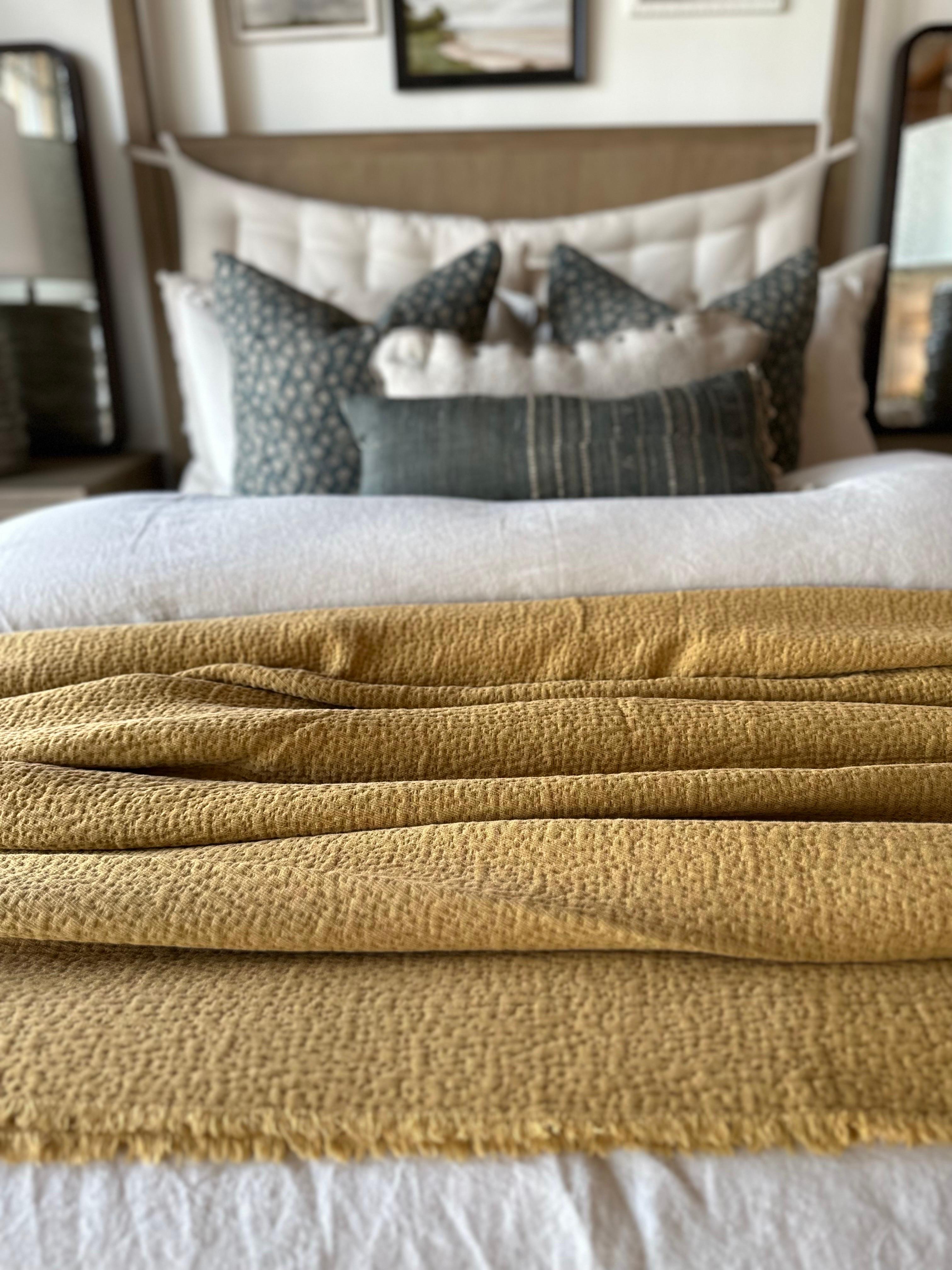 A soft plush cotton textured coverlet. Great to use as an accent at the end of the bed, or use as a coverlet.
Color: Miele ( a soft dijon mustard with brown tone)
Size : 94x107
Large Size can accomodate a queen size or king size bed.
Machine