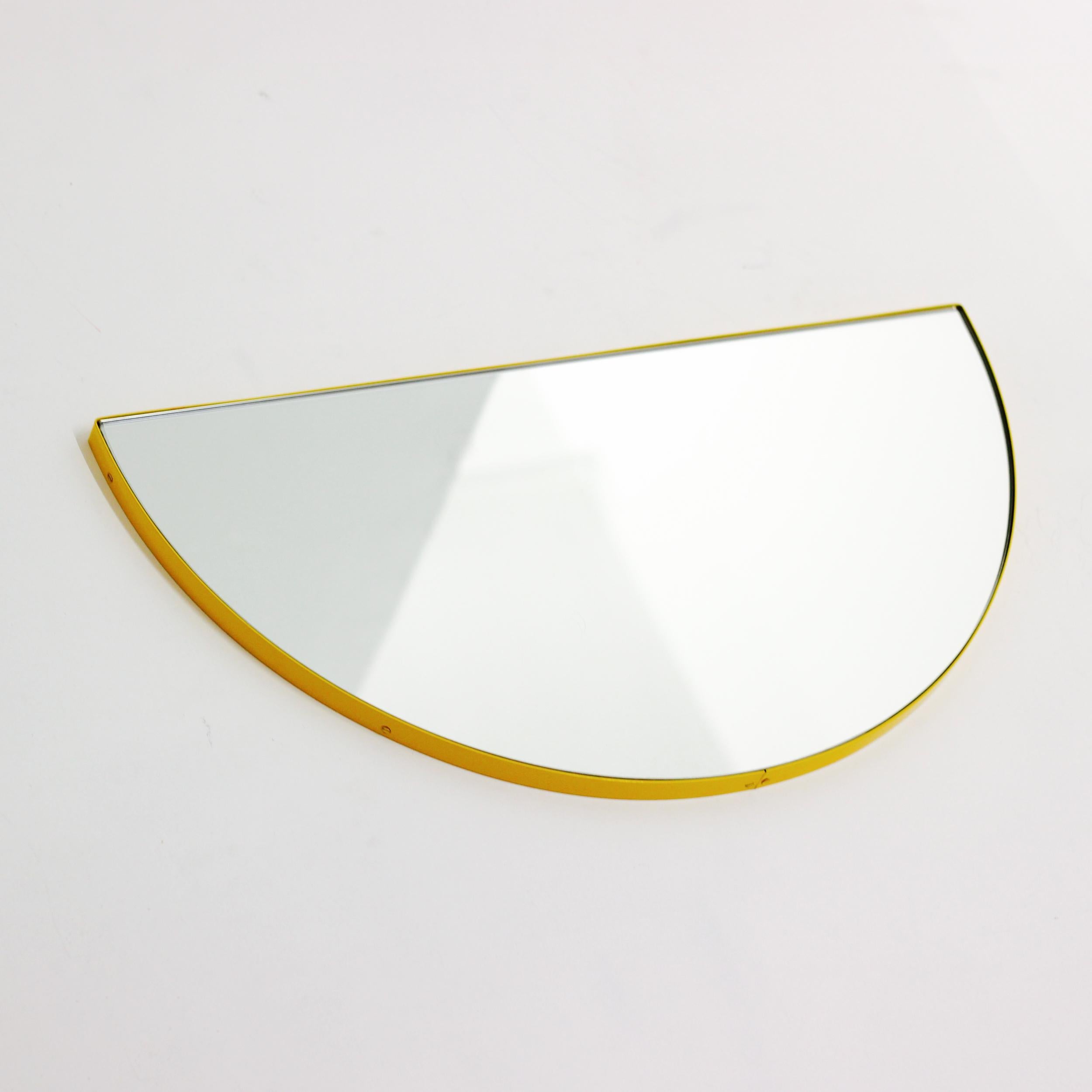 Original and minimalist half-moon mirror with a modern aluminium powder coated frame. Designed and made in London, UK.
 
Fitted with an ingenious French cleat (split batten) system so that the mirror may hang flush with the wall in four possible