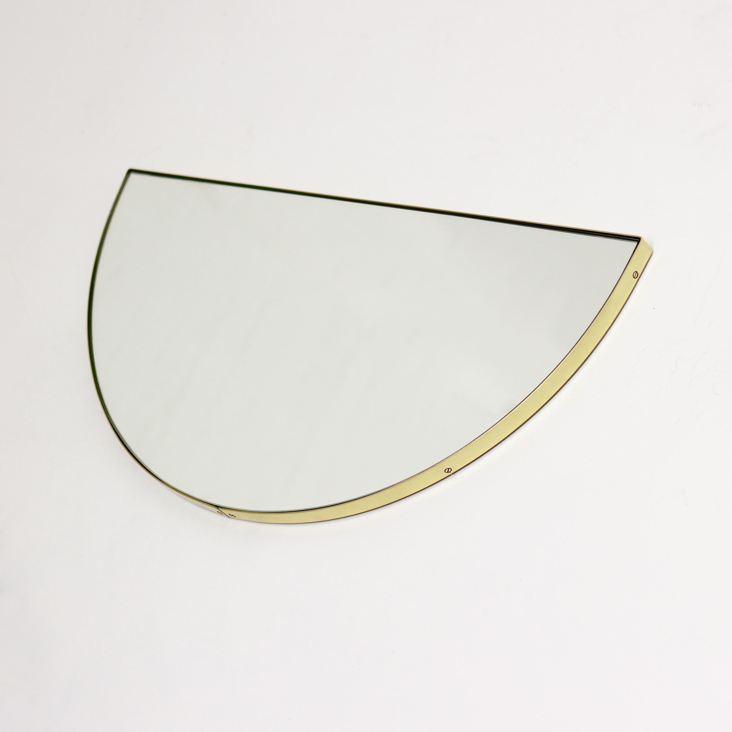 Original and minimalist half-moon mirror with an elegant brushed brass frame. Quality design that ensures the mirror sits perfectly parallel to the wall. Designed and made in London, UK.
 
Fitted with an ingenious French cleat (split batten) system