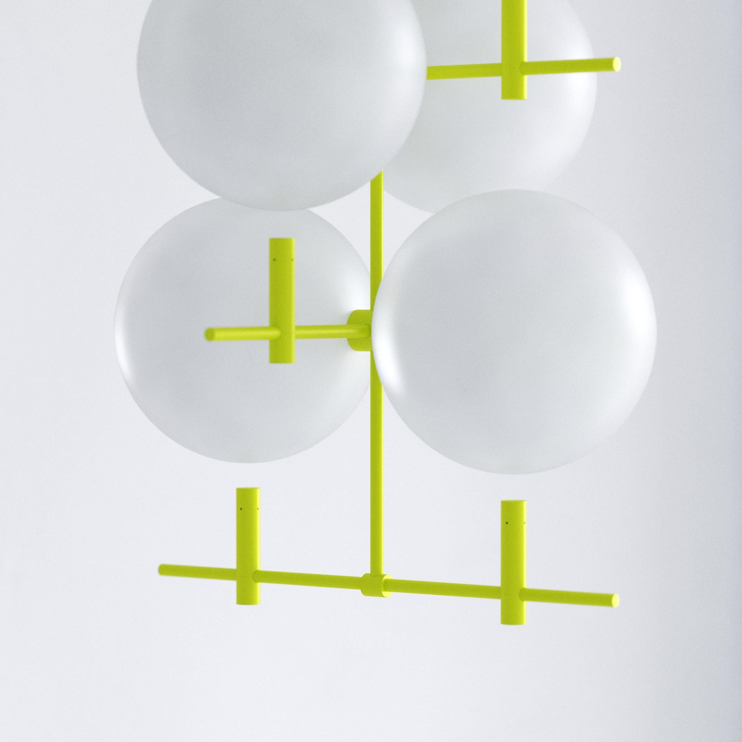 Shifting between day and night, this moody luminaire contrasts monumental hovering glass spheres and subtle metal construction. Luna offers two lighting options. Sun and Moon. Glow and reflection. Soak up the light and let the spheres illuminate the