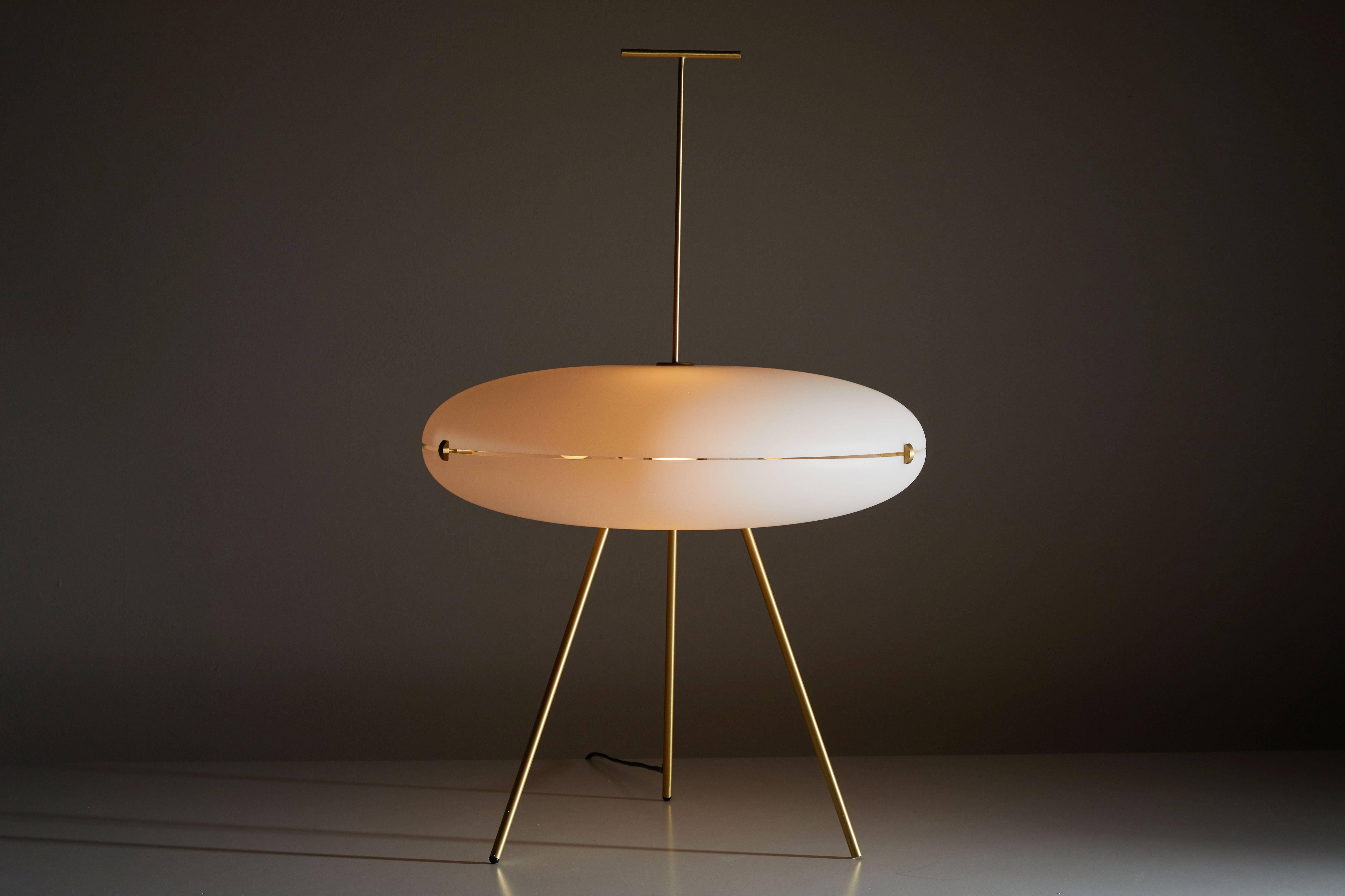 Luna Orizzontale floor lamp by Gio Ponti . Currently produced by Tato Italia. This lamp was built based on an unrealized prototype designed by Gio Ponti and originally intended for the Triennale in Milan in 1957. Brushed brass hardware with acrylic