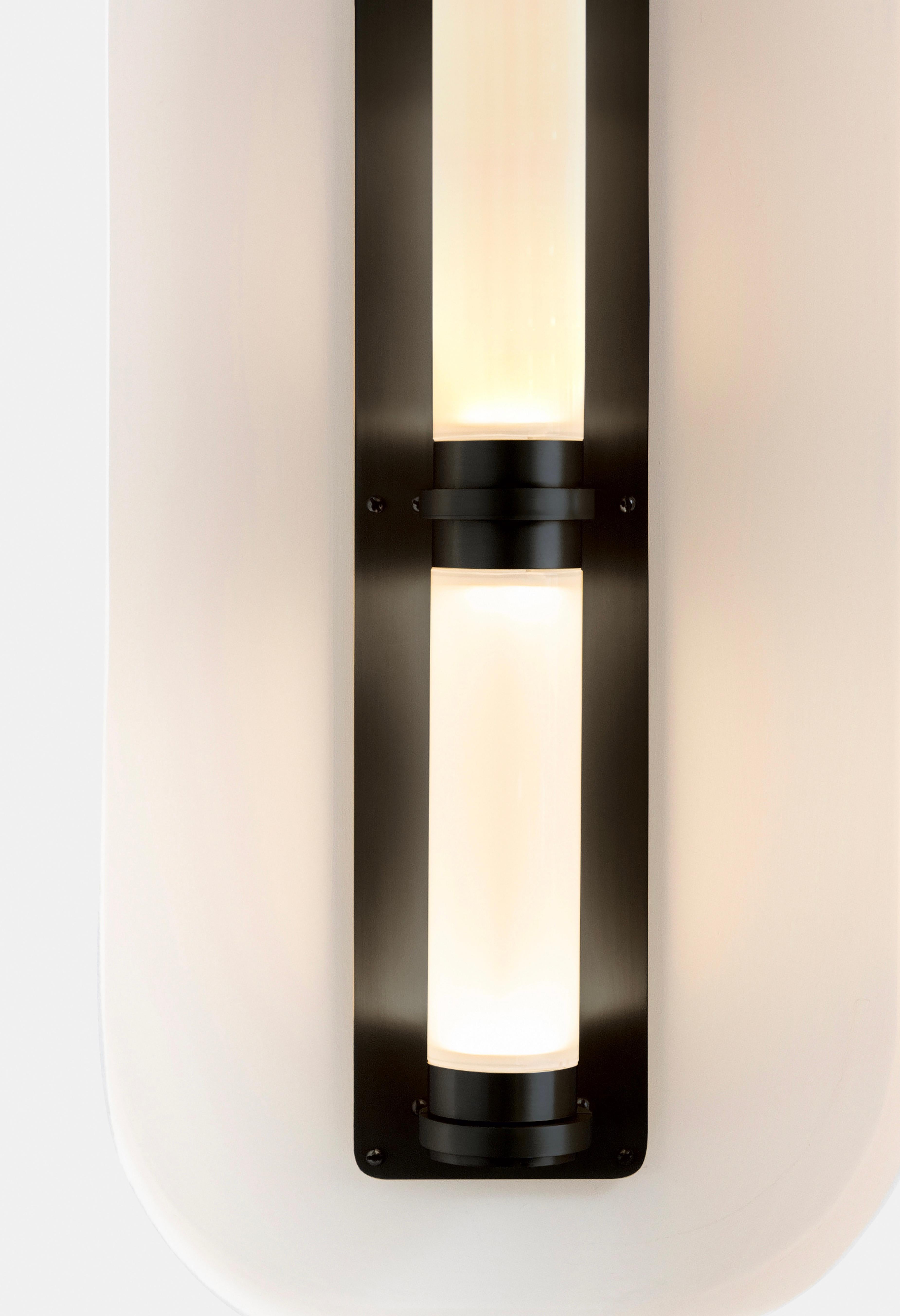 A lighting system with infinite interpretations, the Luna Sconce is an elegant and refined lighting option. Handmade with Gabriel Scott's signature metal and glass combination, this is one of the studio's most popular sconce options.