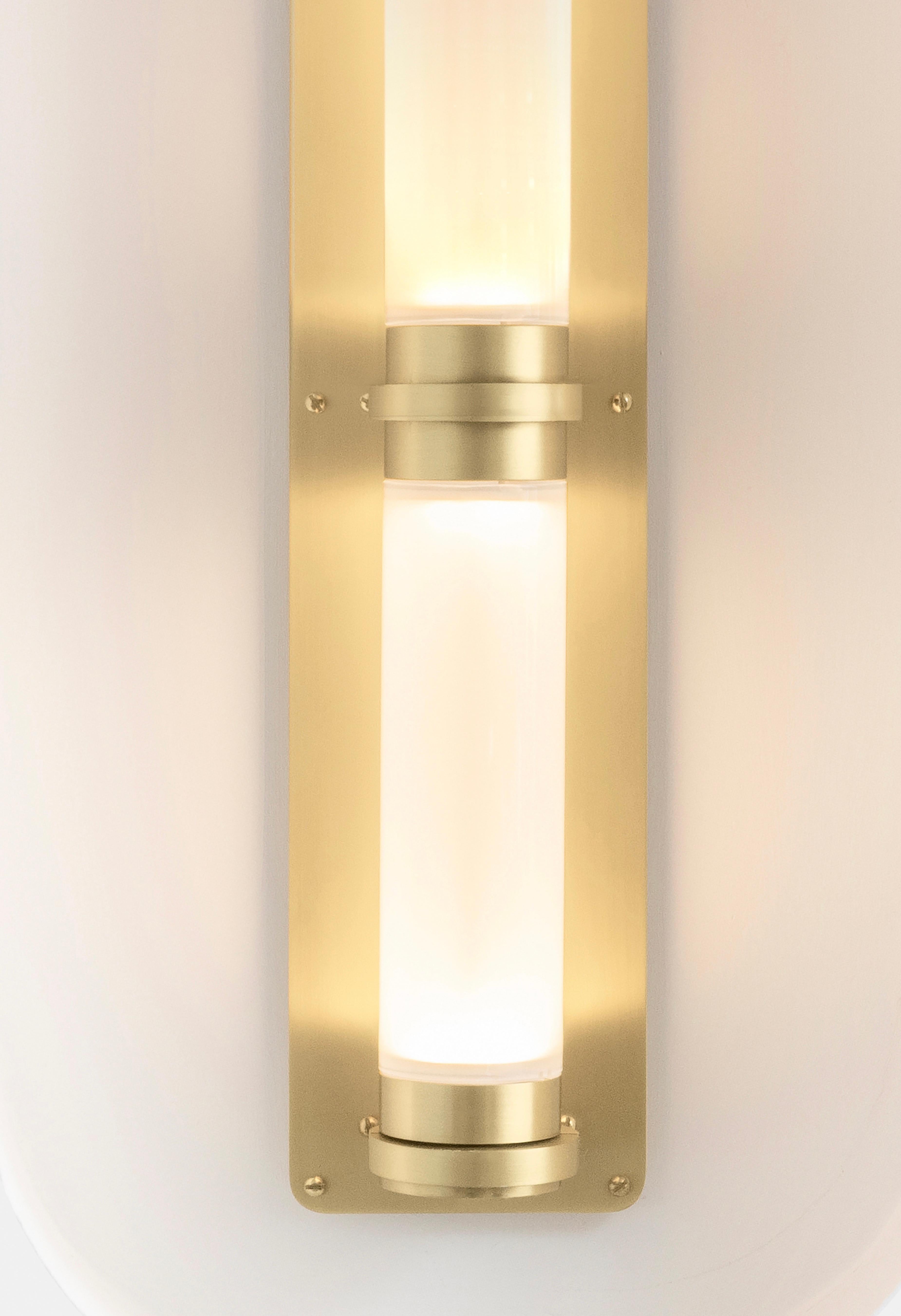 A lighting system with infinite interpretations, the Luna Sconce is an elegant and refined lighting option. Handmade with Gabriel Scott's signature metal and glass combination, this is one of the studio's most popular sconce options.