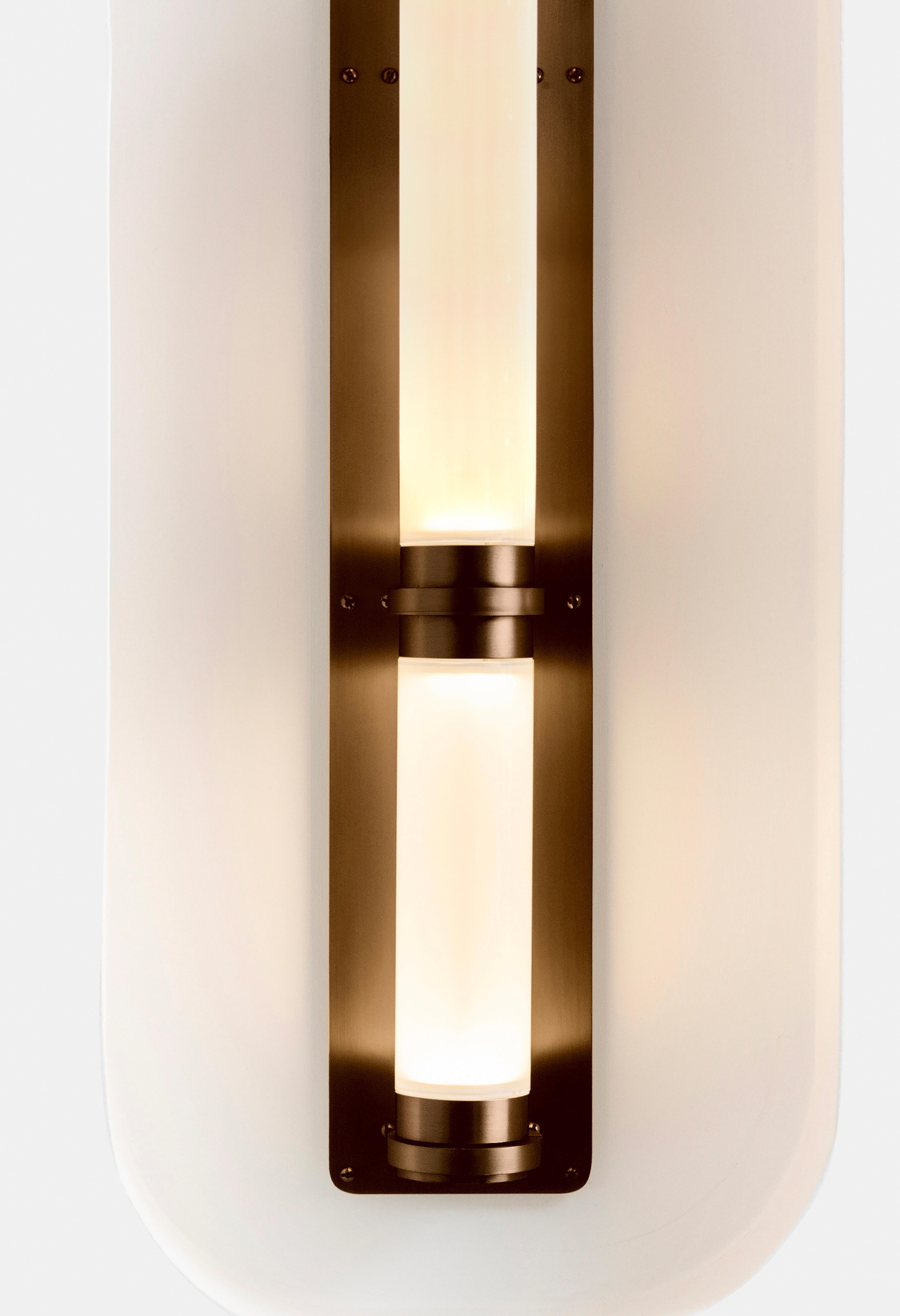A lighting system with infinite interpretations, the Luna Sconce is an elegant and refined lighting option. Handmade with Gabriel Scott's signature metal and glass combination, this is one of the studio's most popular sconce options.
