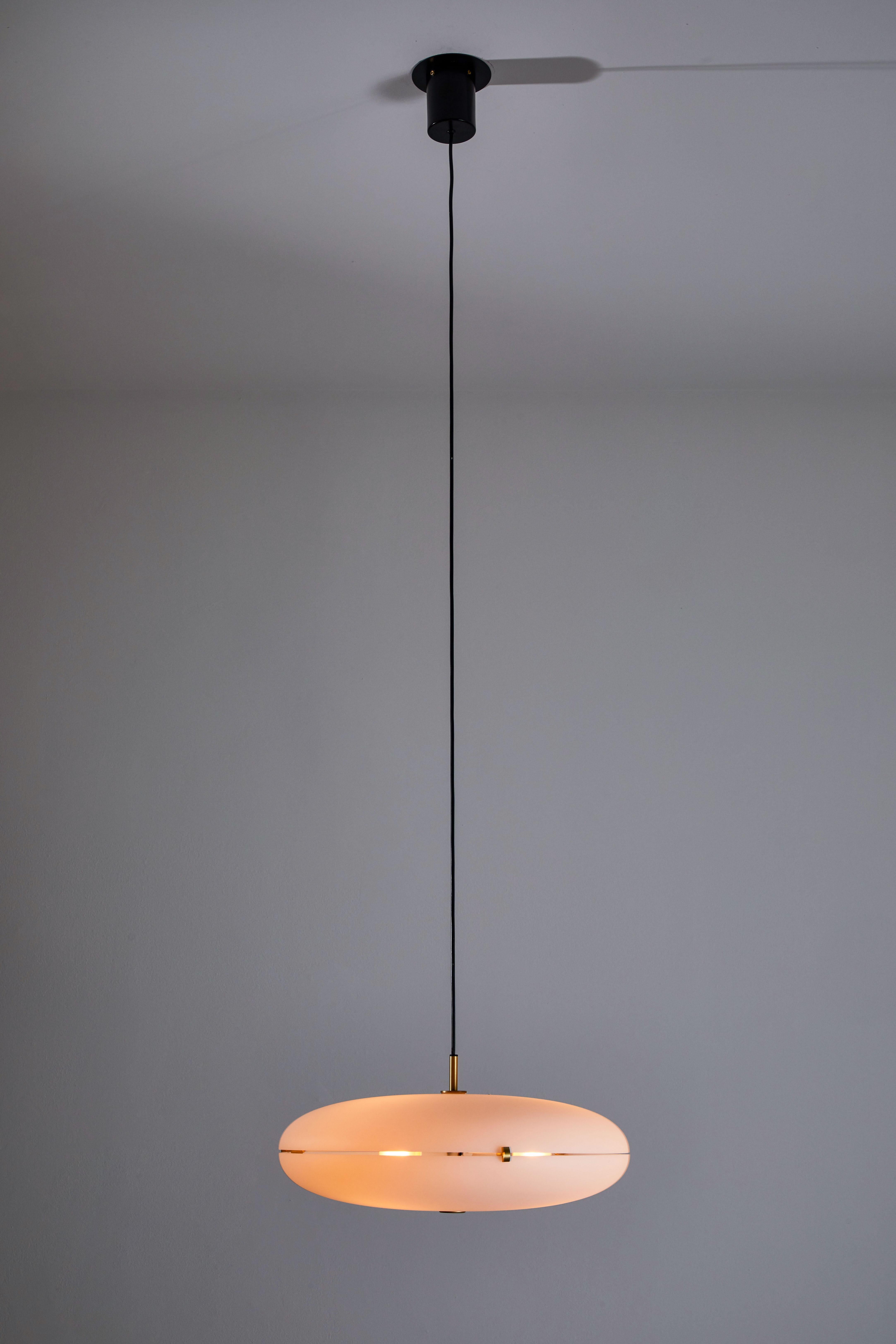 Luna suspension light by Gio Ponti for Tato Italia. Current production designed and manufactured in Italy 2018. Wired for US junction boxes. Brushed satin brass hardware, acrylic diffuser, steel canopy. Takes 3 x LED maximum 11W bulbs, or one E27