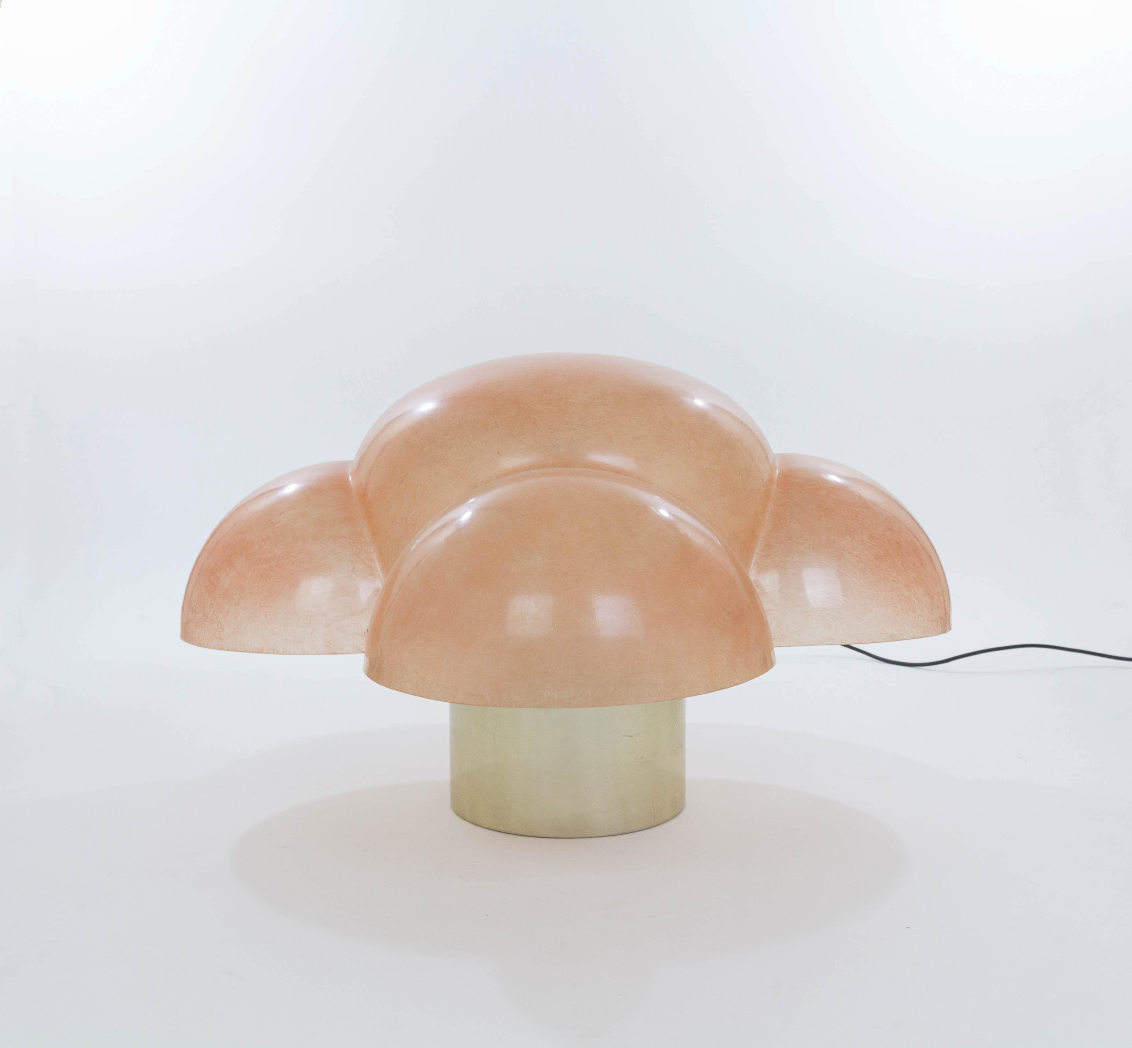 Luna table lamp designed by Gian Emilio, Piero and Anna Monti for Candle in 1968.

Impressive table lamp made of a fiberglass shade resting on a cylindrical metal gold coloured base. The lamp has 5 fittings (E27, maximum 60 watts). The switch has