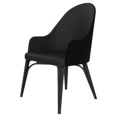 Luna upholstered armchair with steel legs