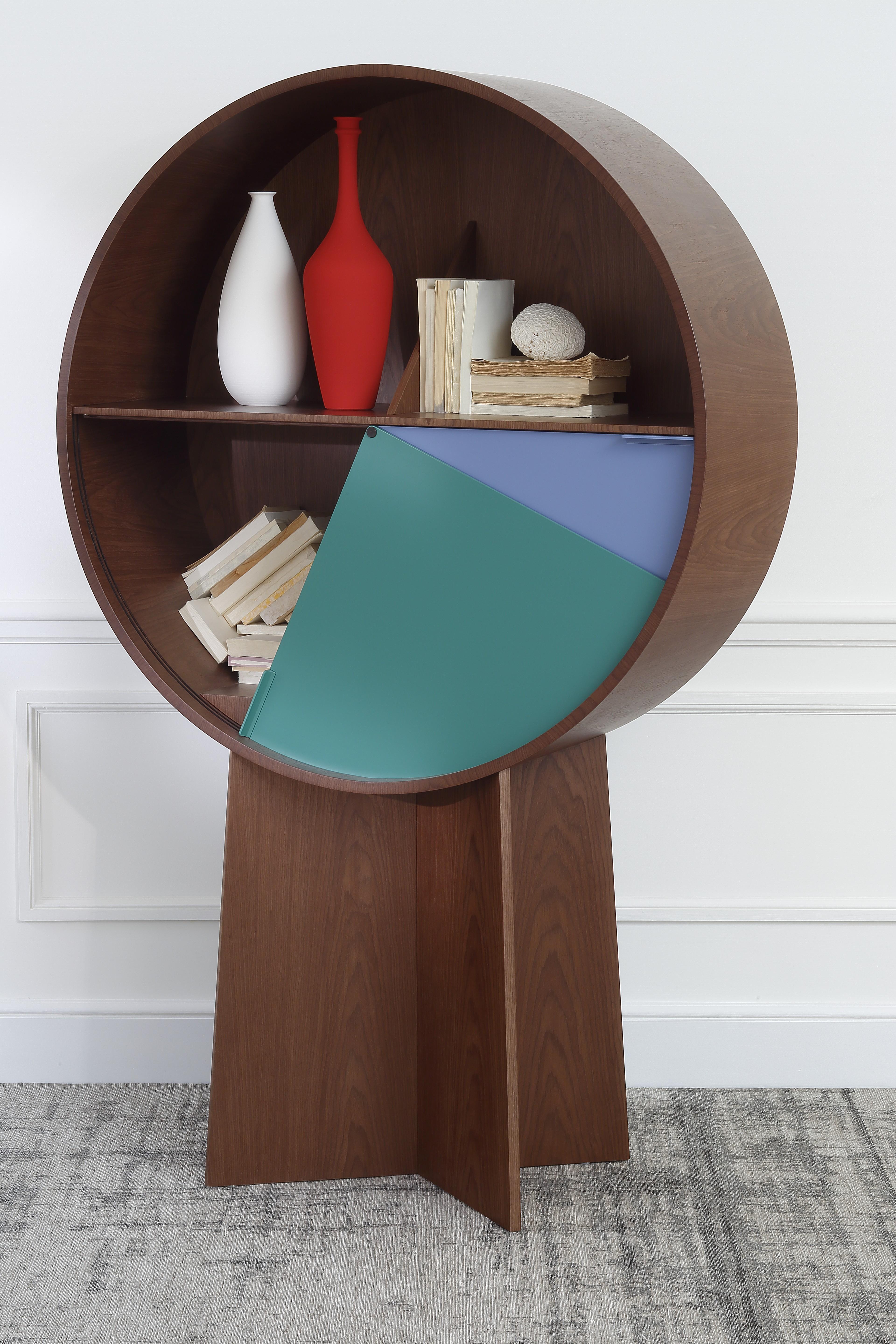 Luna walnut cabinet by Patricia Urquiola
Materials: Walnut veneer on MDF
Dimensions: 110 x 40 x 175 cm

The Luna is a strong and creative piece, in walnut veneer or in orange
lacquered medium, with 2 sliding doors. It is a colorful storage