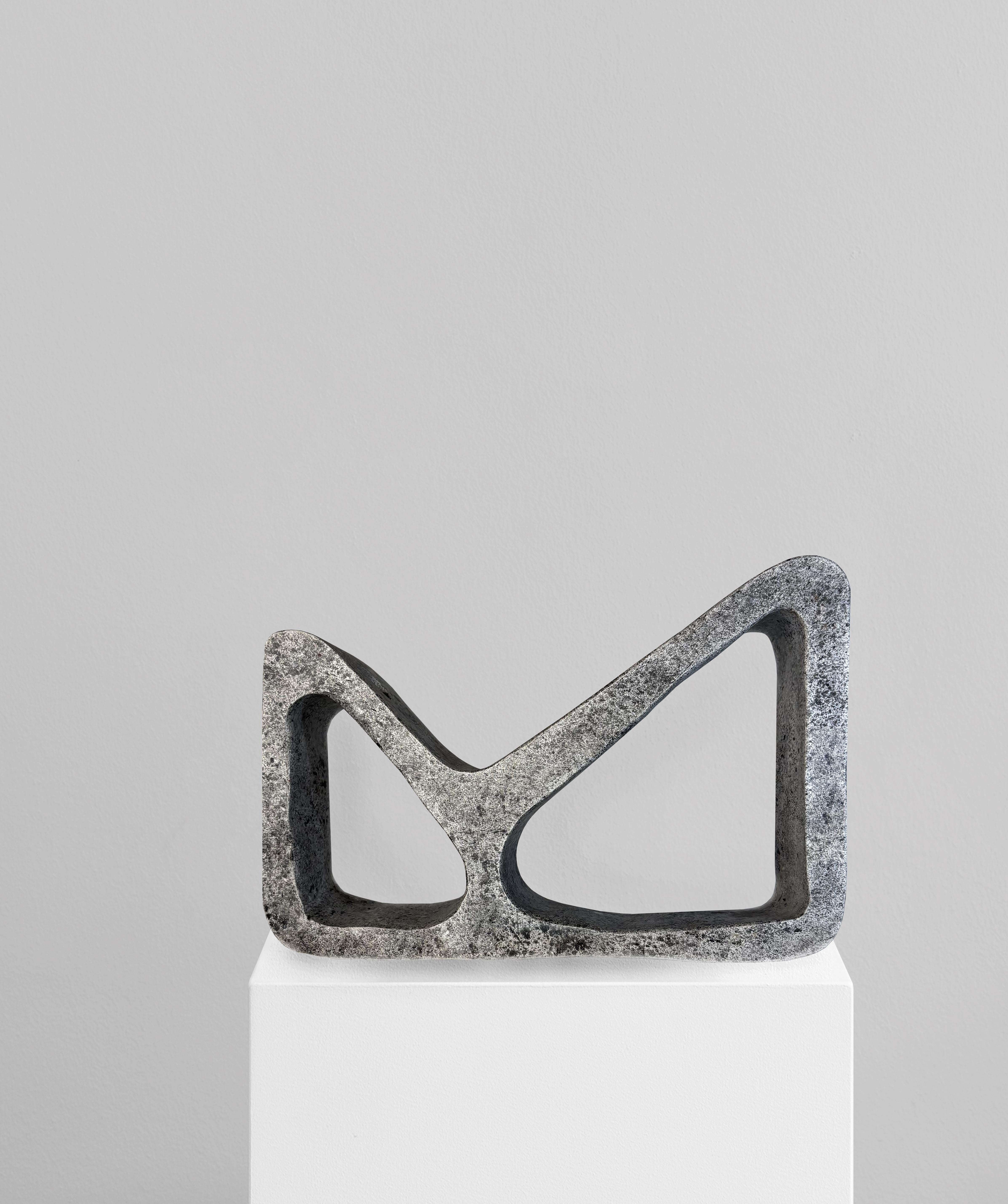 LunaparkGrey Vase by Erica Zanella
Dimensions: D 7 x W 35 x H 23 cm. 
Materials: Plaster.

Lunapark features an abstract, geometric form defined by sharp lines and pronounced angles. The balance of the shape is anchored by the right
angle at the