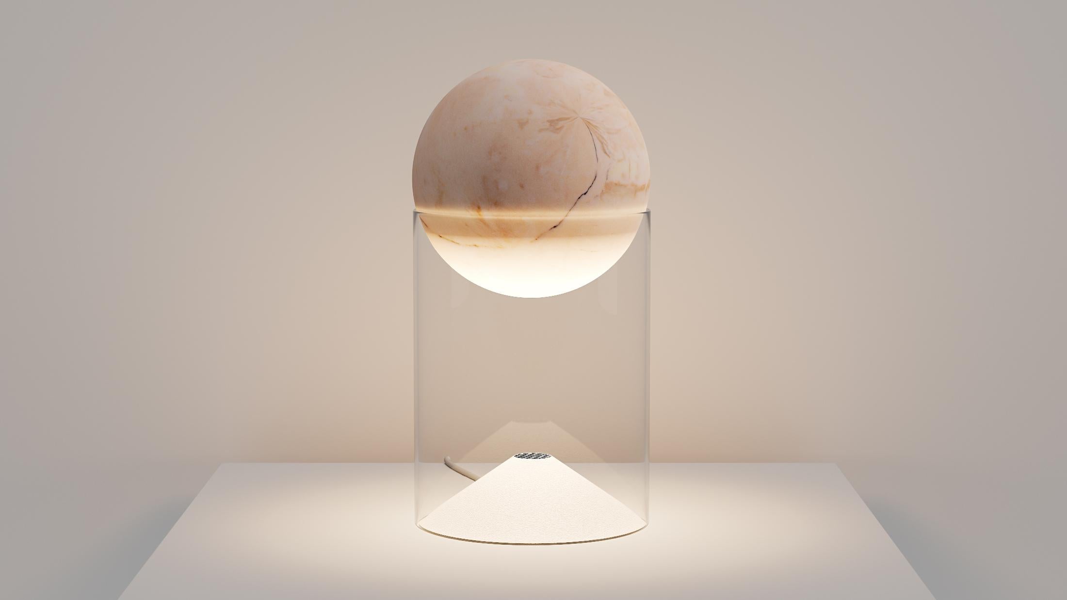 Lunar 15 table lamp by Studio Roso
Dimensions: D15 x H29.5 cm
Material: Stone (marble or sandstone), glass
Weight: 3.5 kg 

All our lamps can be wired according to each country. If sold to the USA it will be wired for the USA for
